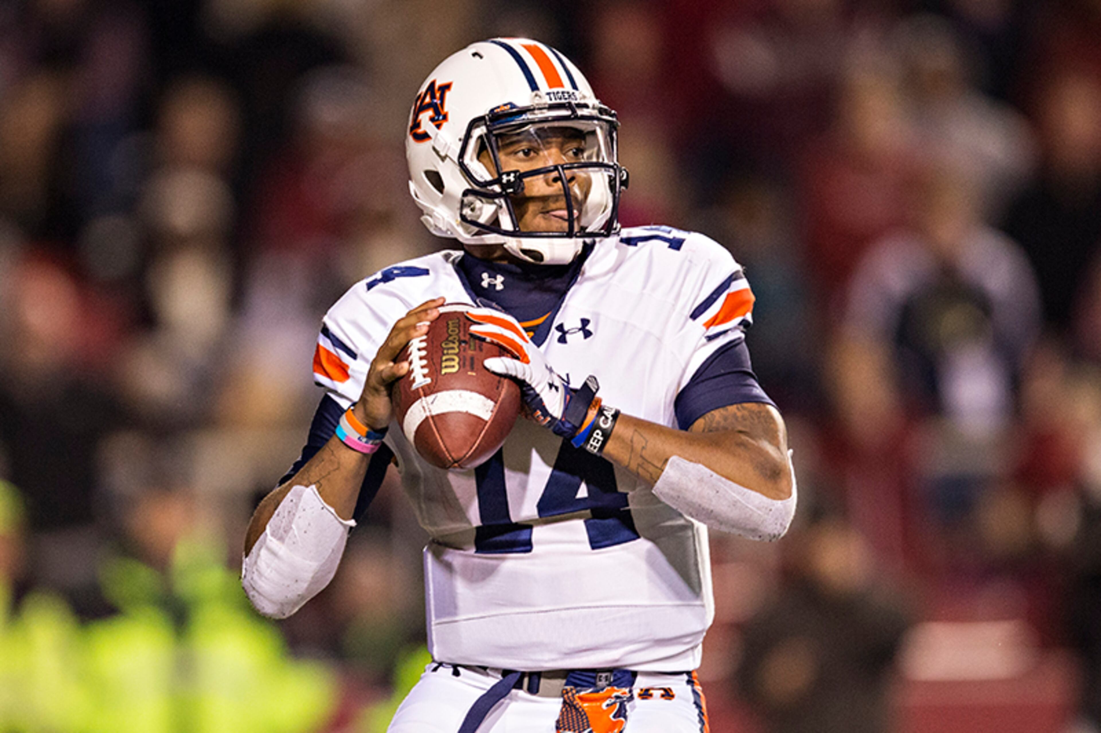 Dual-threat Auburn quarterback Nick Marshall has thrown for 1,627 yards, 5 interceptions and 11 touchdowns. On the ground, he has gained 922 yards on 140 carries with 10 touchdowns. Marshall, an AJC Super 11 selection while at Wilcox County, Ga., went to Georgia as a defensive back. He was dismissed from the team and after a season at Garden City Community College in Kansas emerged as Auburn's signal caller.