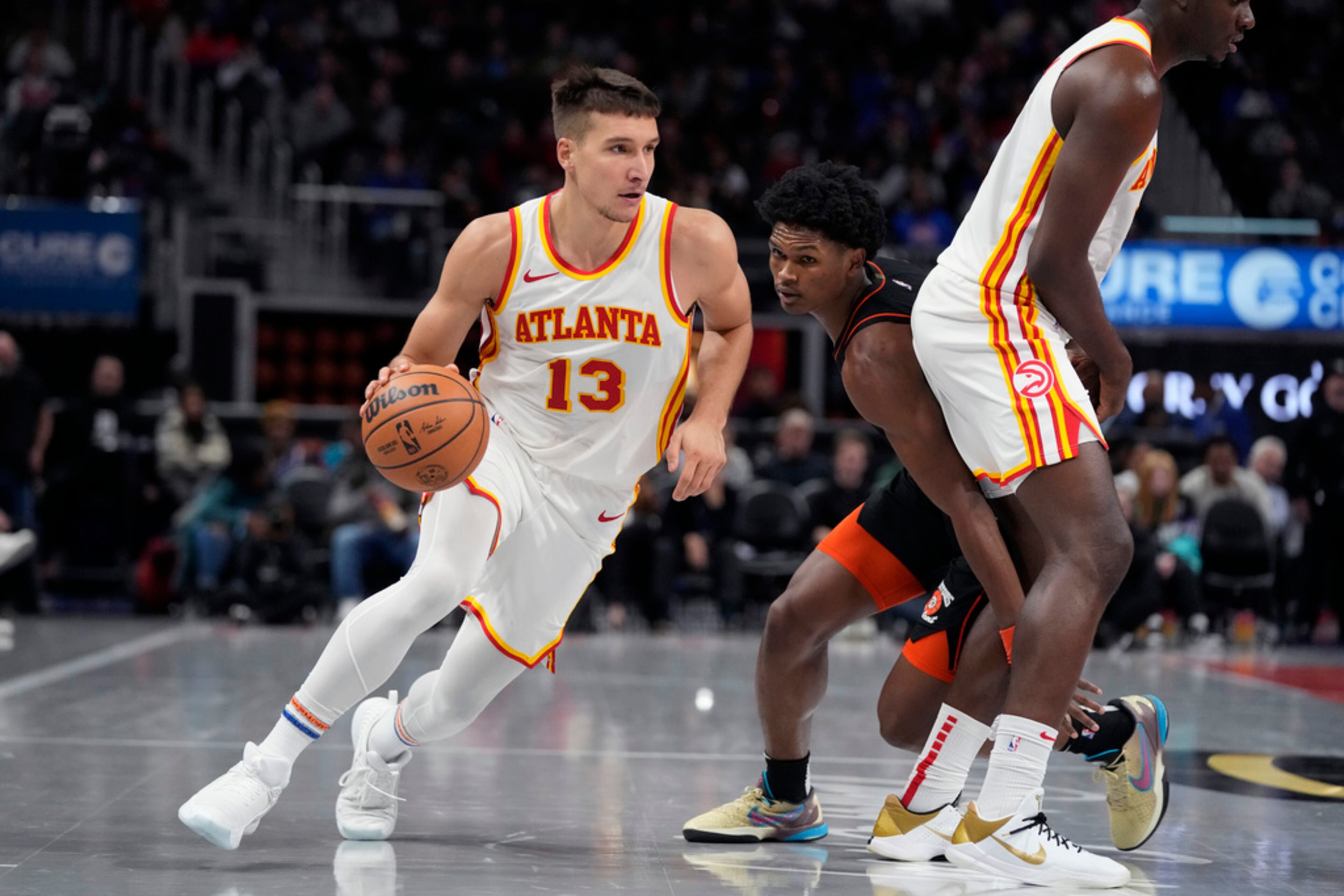 Atlanta Hawks guard Bogdan Bogdanovic (13) drives during the first half of an NBA basketball game against the Detroit Pistons, Tuesday, Nov. 14, 2023, in Detroit. (AP Photo/Carlos Osorio)