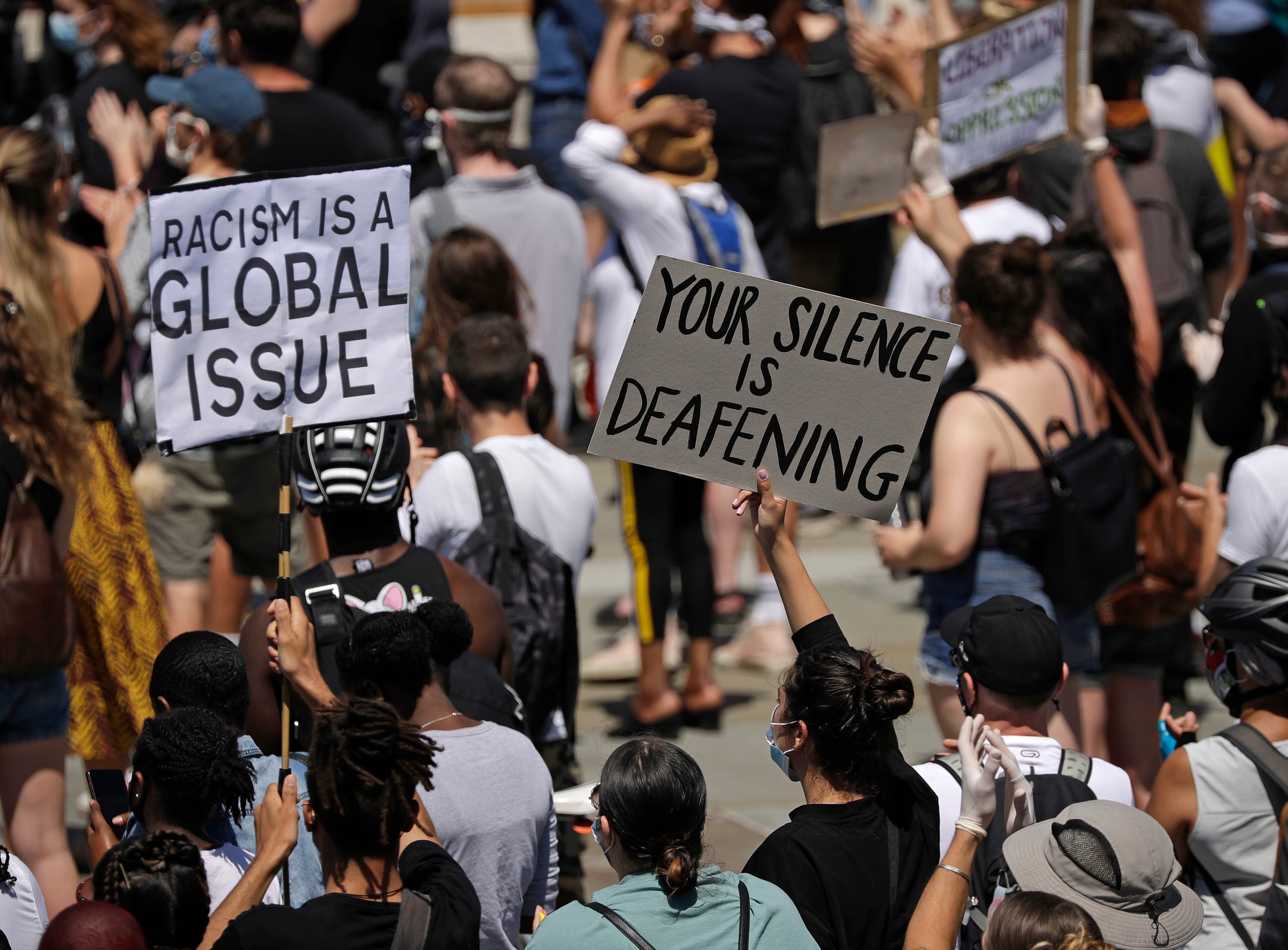 People gather in Trafalgar Square in central London on Sunday, May 31, 2020 to protest against the recent killing of George Floyd by police officers in Minneapolis that has led to protests across the US. (AP Photo/Matt Dunham)