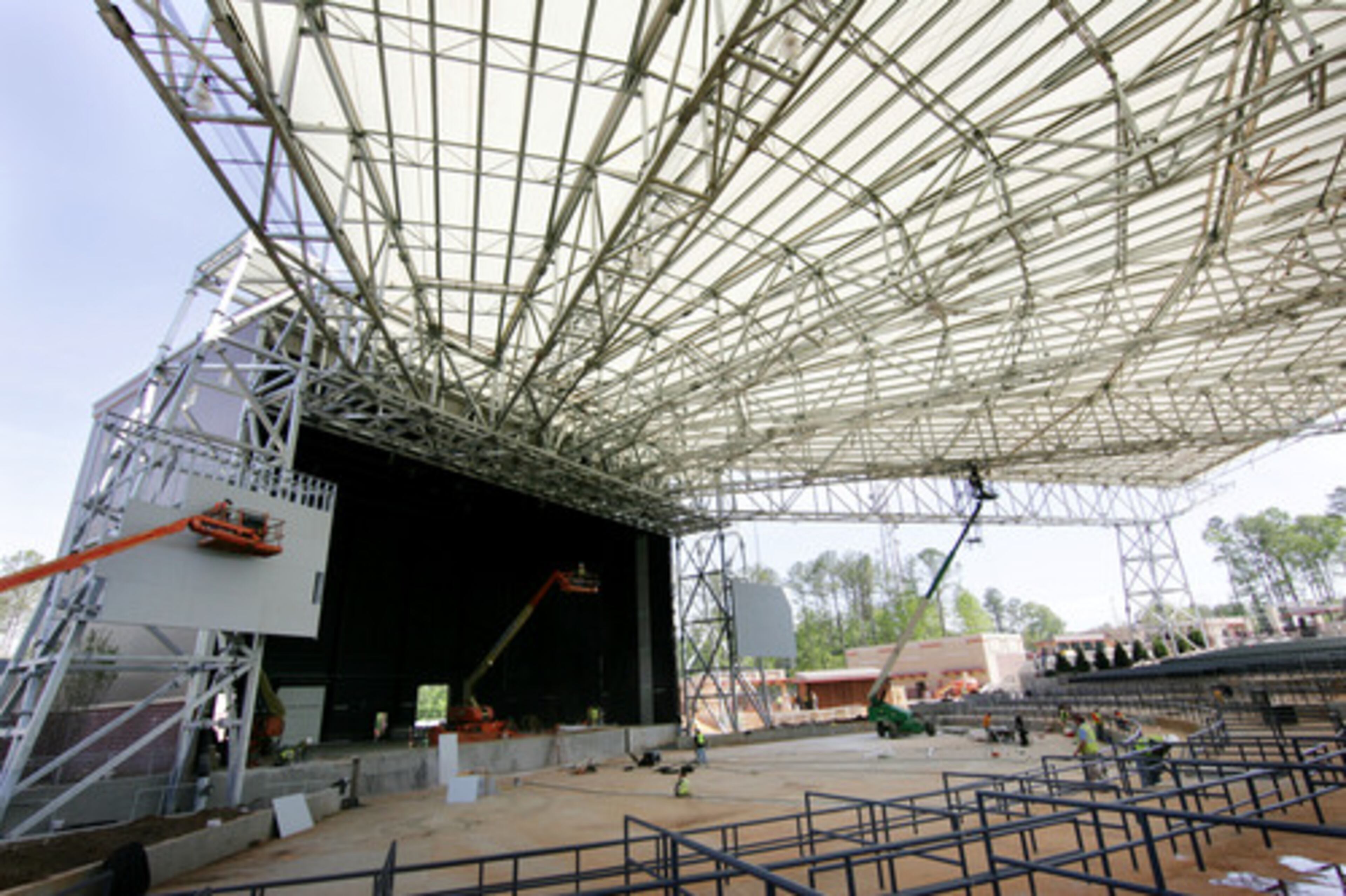 SCREENS ARE being built on either side of the stage, and the open area will accommodate table seating.