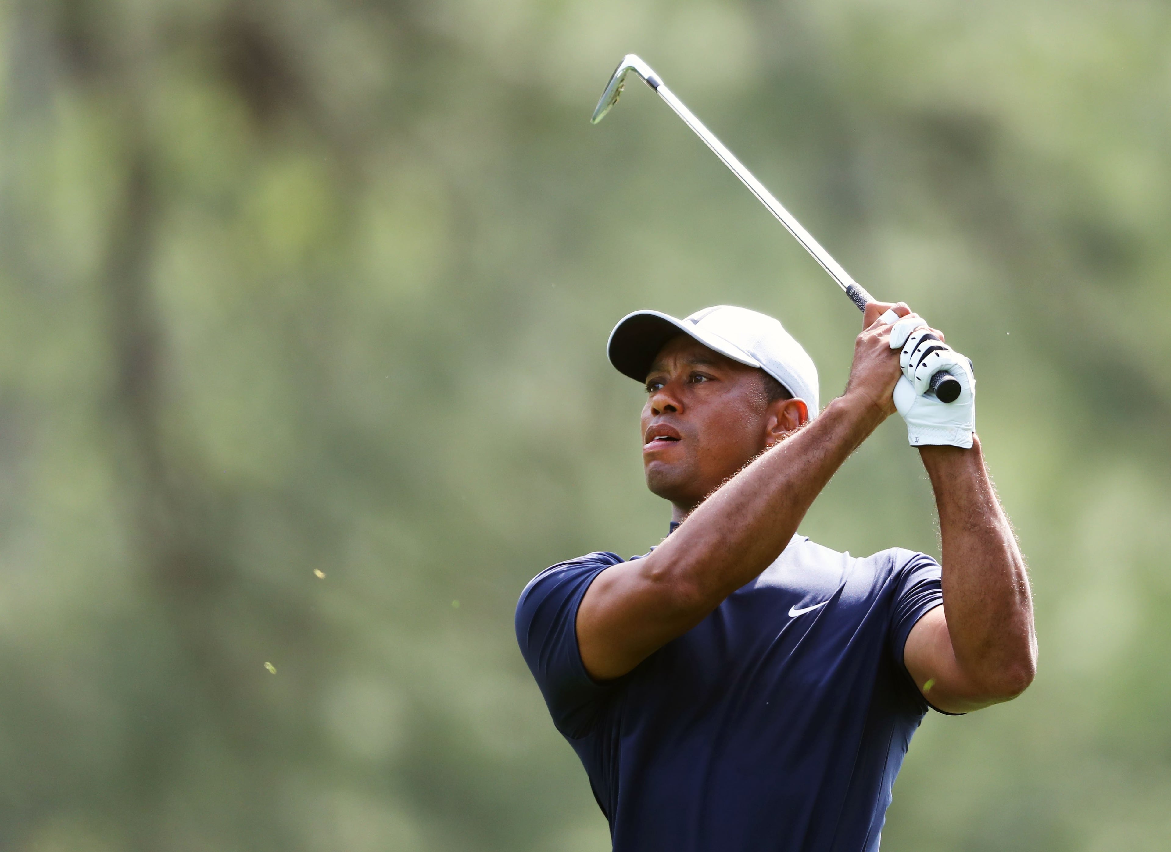 April 11, 2019 - Augusta - Tiger Woods hits from the first fairway during the first round of the Masters Tournament Thursday, April 11, 2019, at Augusta National Golf Club in Augusta. Curtis Compton / ccompton@ajc.com
