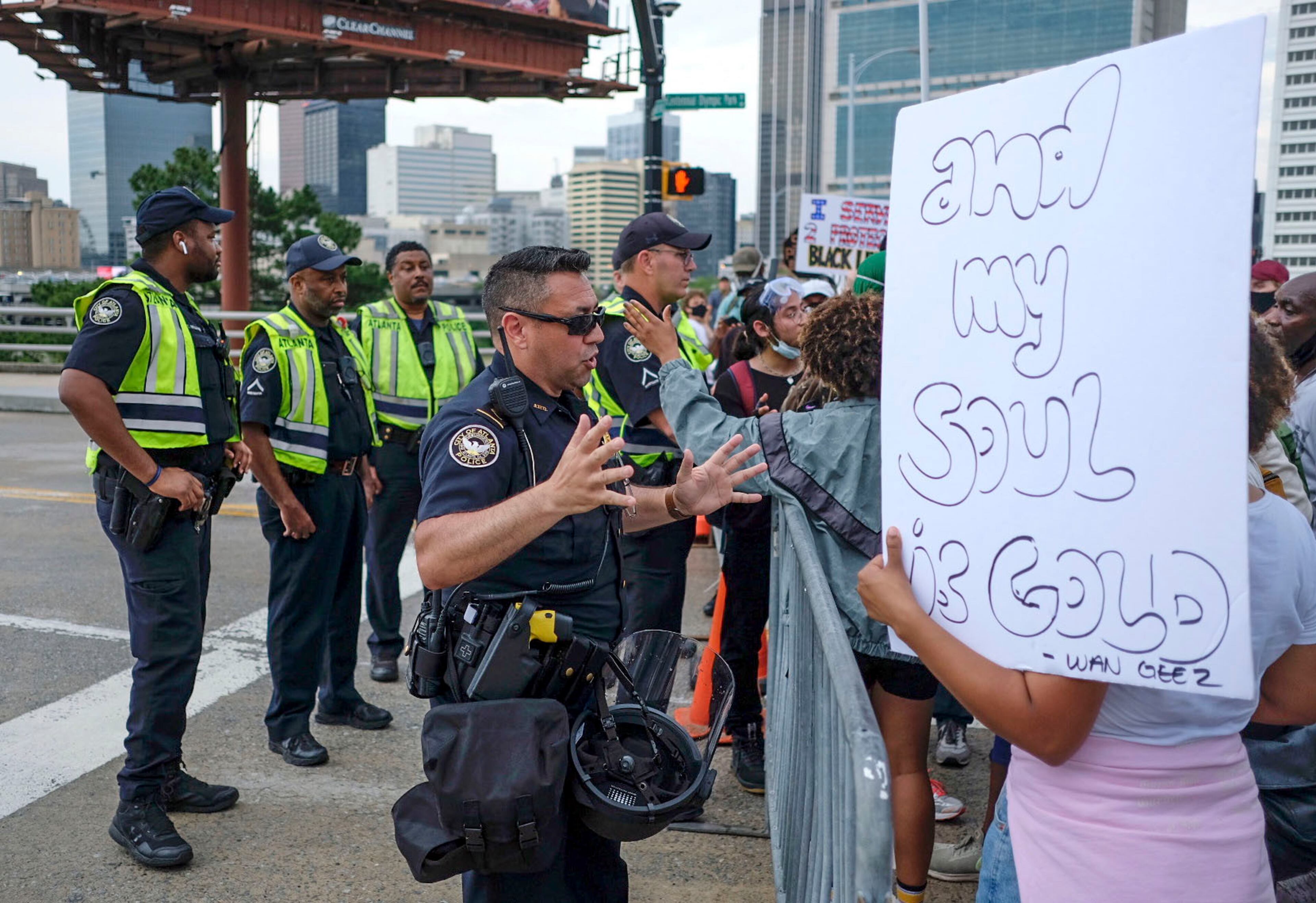 Police briefly blocked crowds from moving between Mercedes-Benz Stadium and Centennial Olympic Park.
