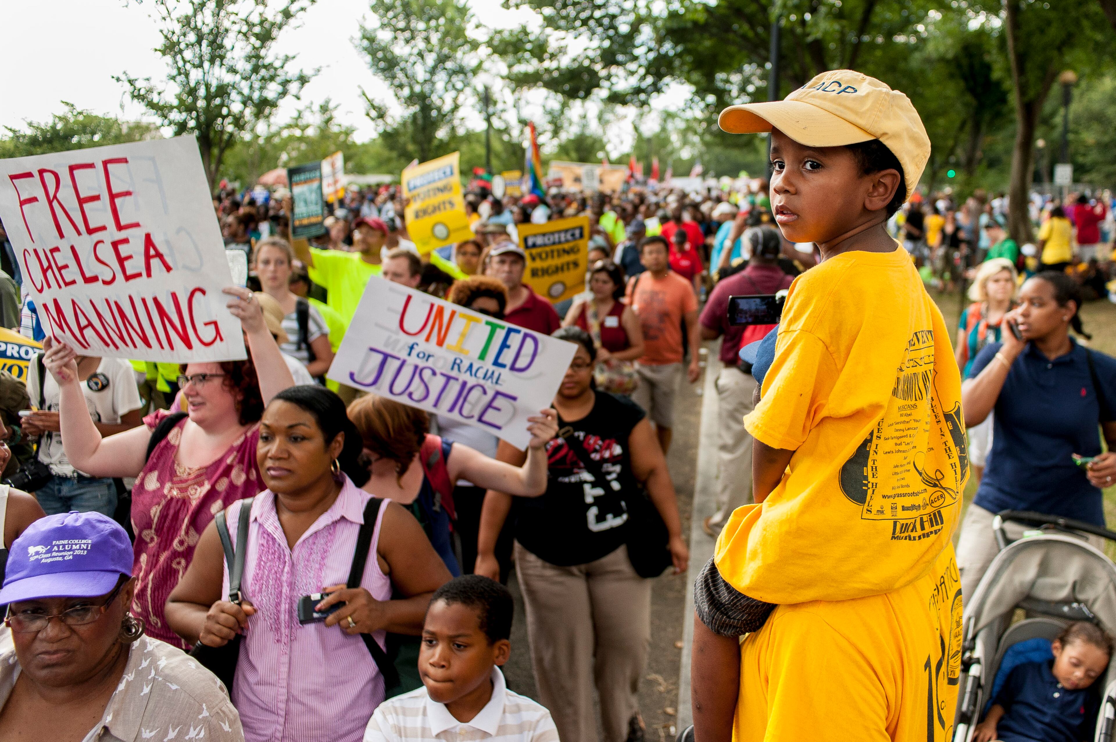 People arrive at the National Mall to celebrate the 50th anniversary of the March on Washington and Dr. Martin Luther King, Jr.'s 'I have a Dream' speech on the National Mall on August 24, 2013 in Washington, DC. A commemorative march and a rally along the historic route followed in 1963 is led by civil rights leaders Al Sharpton and Martin Luther King III. (Photo by Pete Marovich/Getty Images)