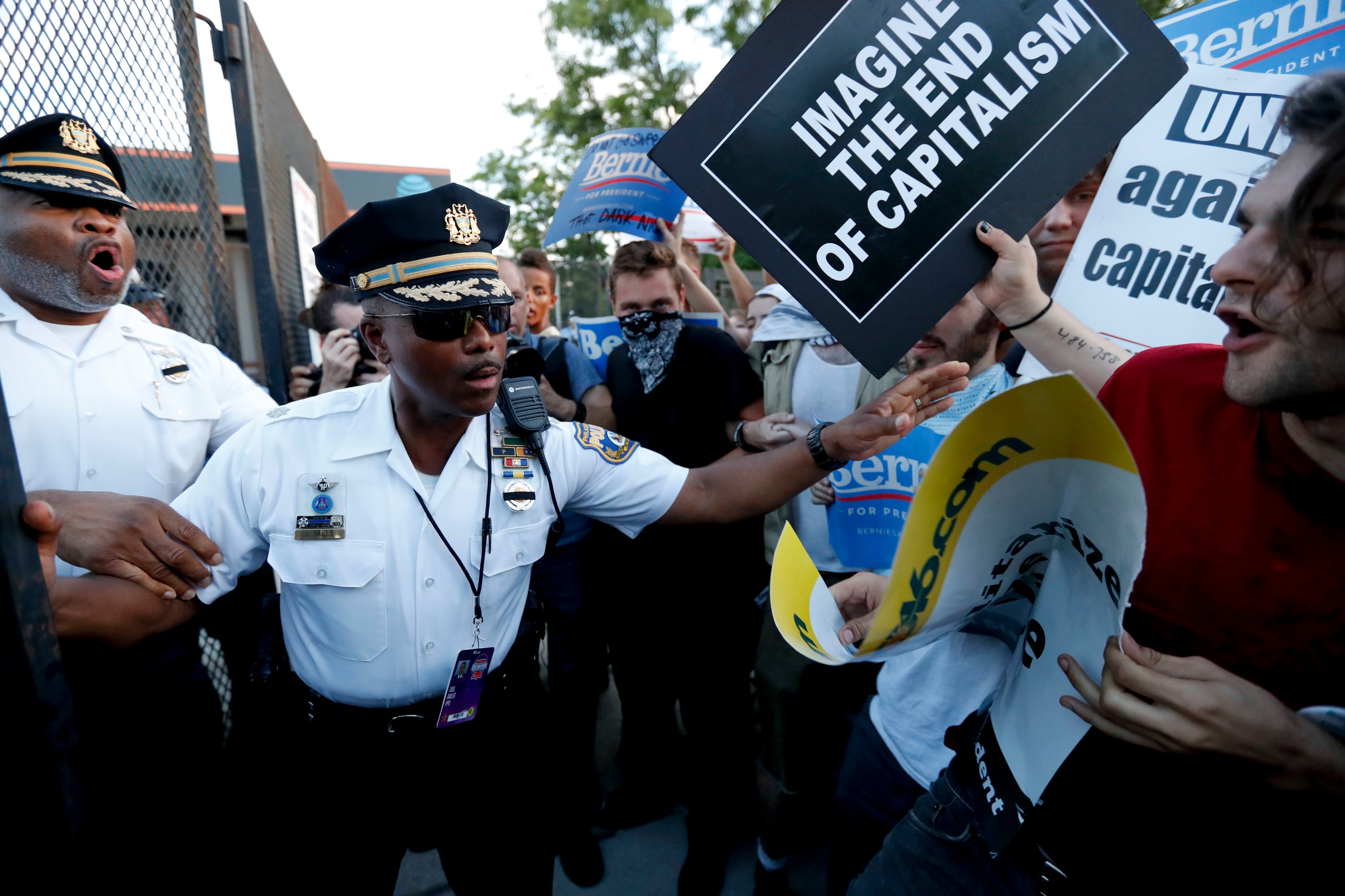 Demonstrators clash with police near the AT&T Station in Philadelphia, Tuesday, July 26, 2016, during the second day of the Democratic National Convention. (AP Photo/Alex Brandon)