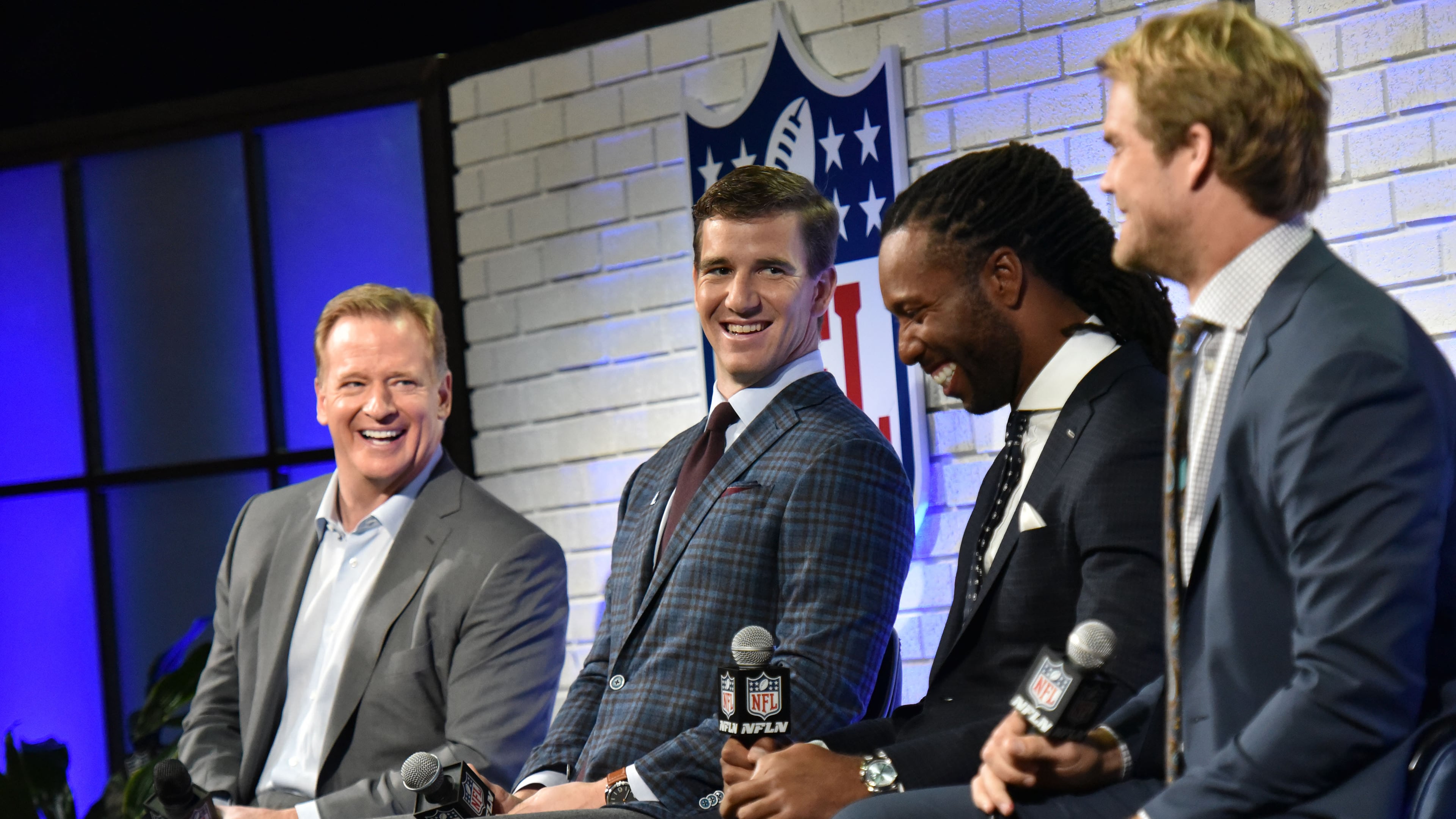 NFL Commissioner Roger Goodell, left, and players Eli Manning, Greg Olsen and Larry Fitzgerald, discussed topics including patriotism with fans. AJC photo: Hyosub Shin