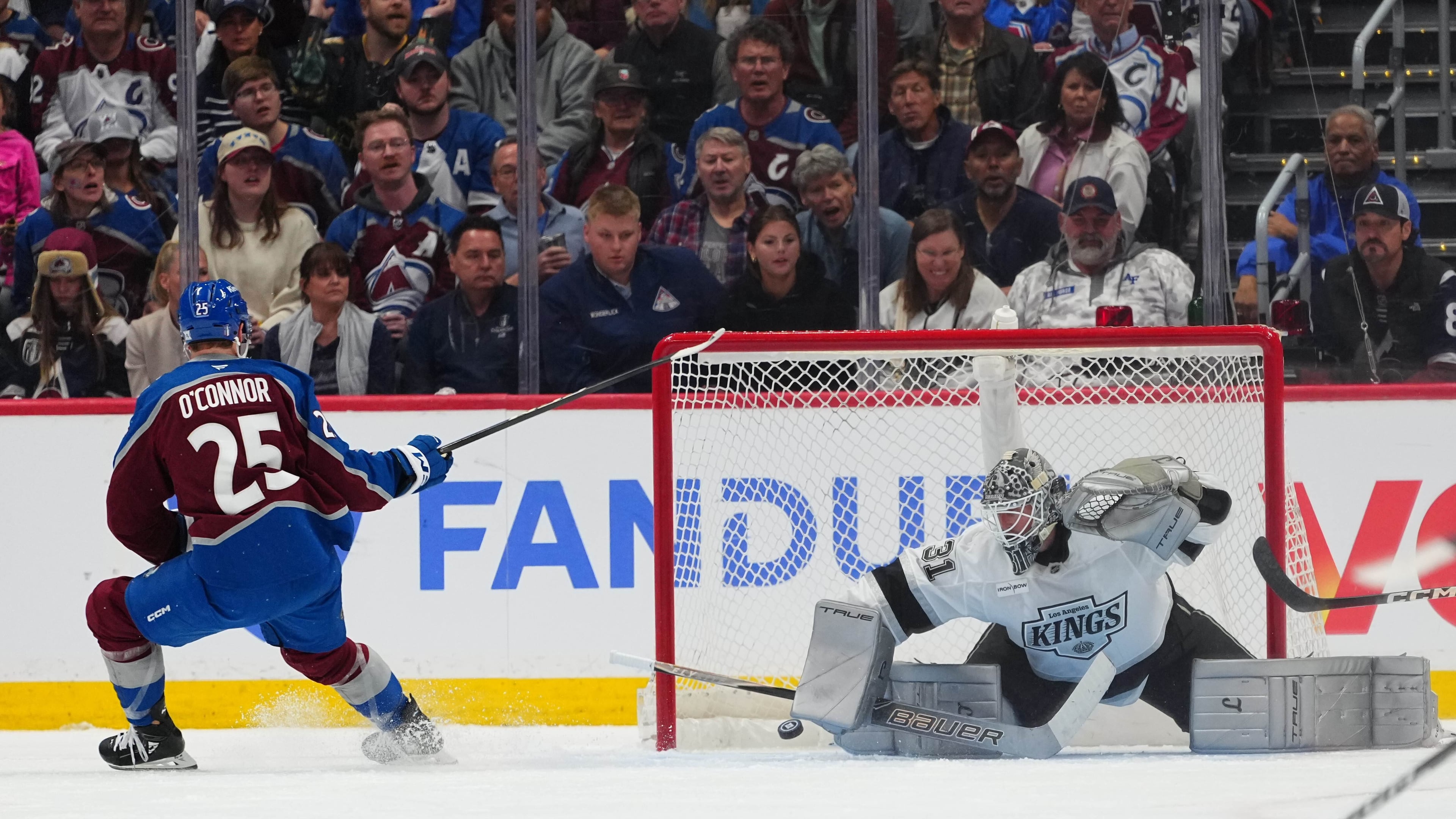 Colorado Avalanche right wing Logan O'Connor (25) scores against Los Angeles Kings goaltender Anton Forsberg (31) during the third period of Game 1 in the first round of the NHL hockey Stanley Cup playoffs, Sunday, April 19, 2026, in Denver. (AP Photo Jack Dempsey)