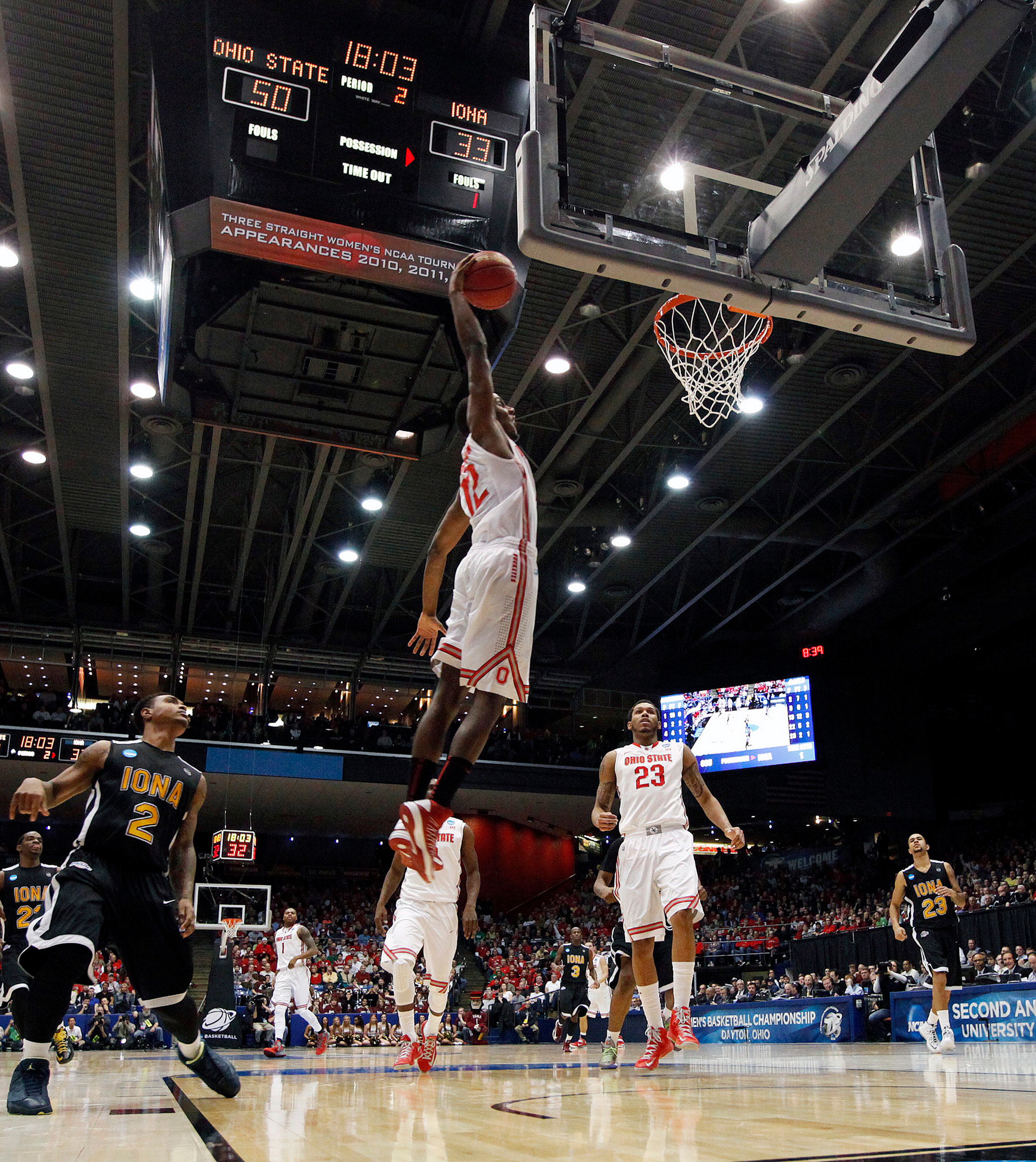 Ohio State's Sam Thompson (12) throws down an alley-oop dunk against Iona during the second half in the second round of the NCAA Tournament at the University of Dayton Arena, in Dayton, Ohio, on Friday, March 22, 2013. Ohio State advanced, 95-70. (Kyle Robertson/Columbus Dispatch/MCT)