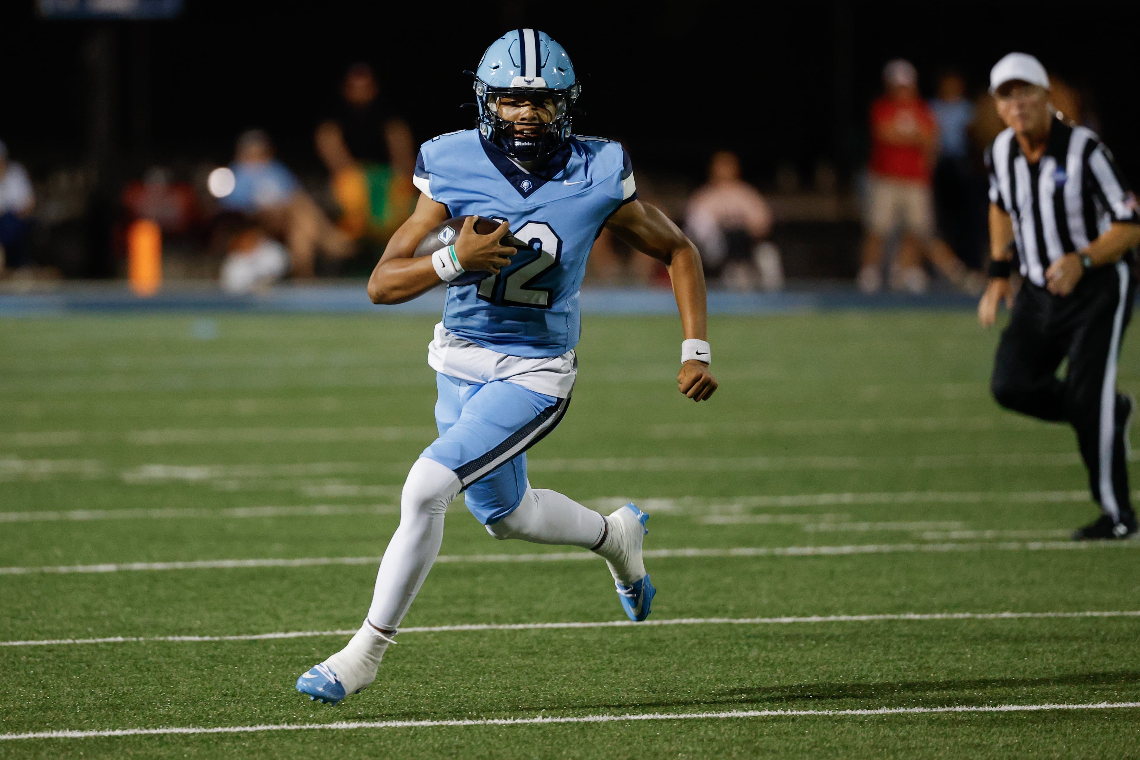 North Cobb Christian’s Jayden McCullough scrambles against KIPP Atlanta during their game on Friday, Oct. 2, 2026, in Kennesaw. (Erik S. Lesser for the AJC)