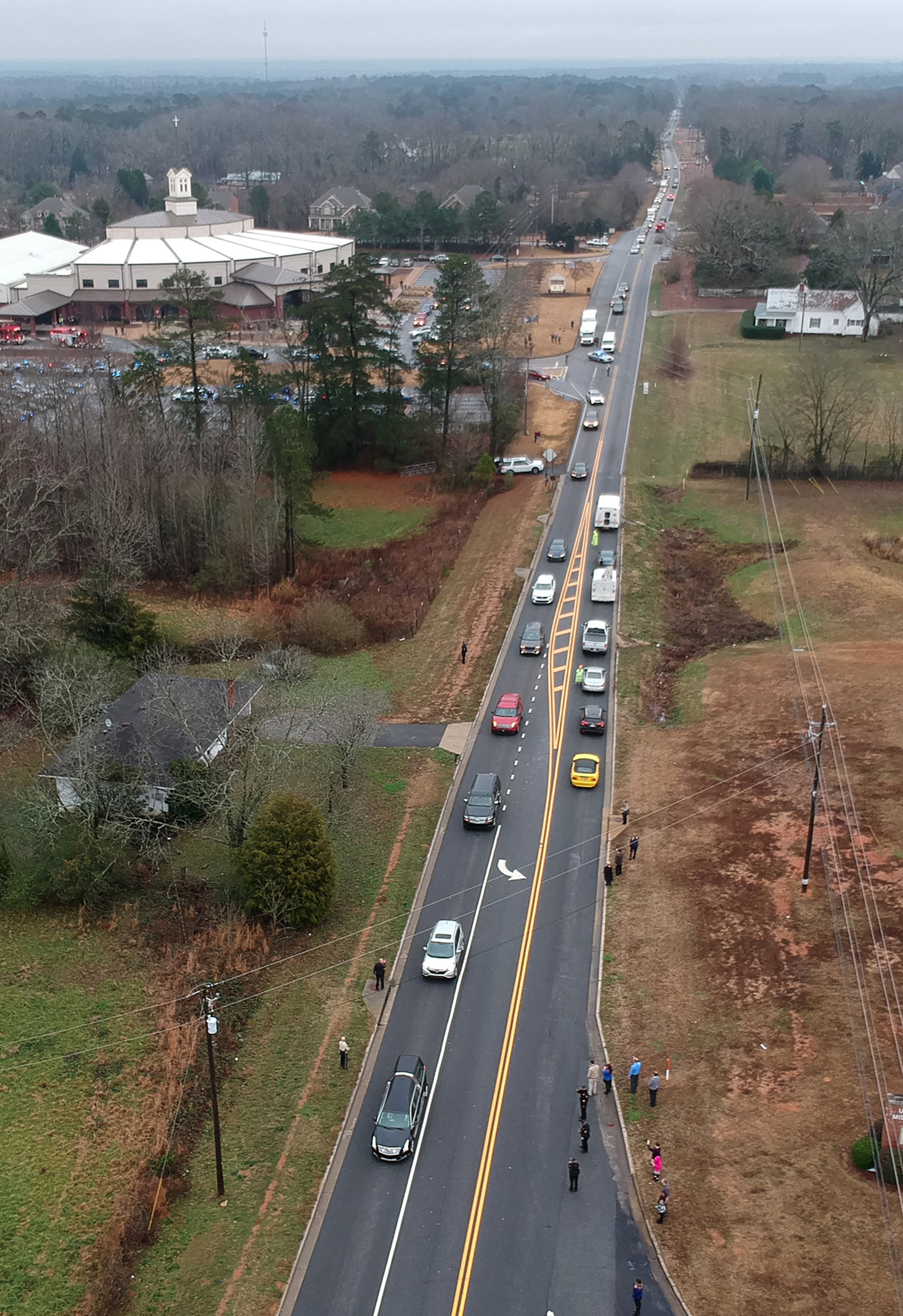 January 3, 2019 McDonough -The procession of Henry County police Officer Michael Smith left Glen Haven Baptist Church in McDonough on Thursday, January 3, 2019. Officer Michael Smith died at 4:30 a.m. at Piedmont Atlanta Hospital due to complications from a gunshot wound he sustained Dec. 6, according to Henry County police. He was 33 years old. HYOSUB SHIN / HSHIN@AJC.COM