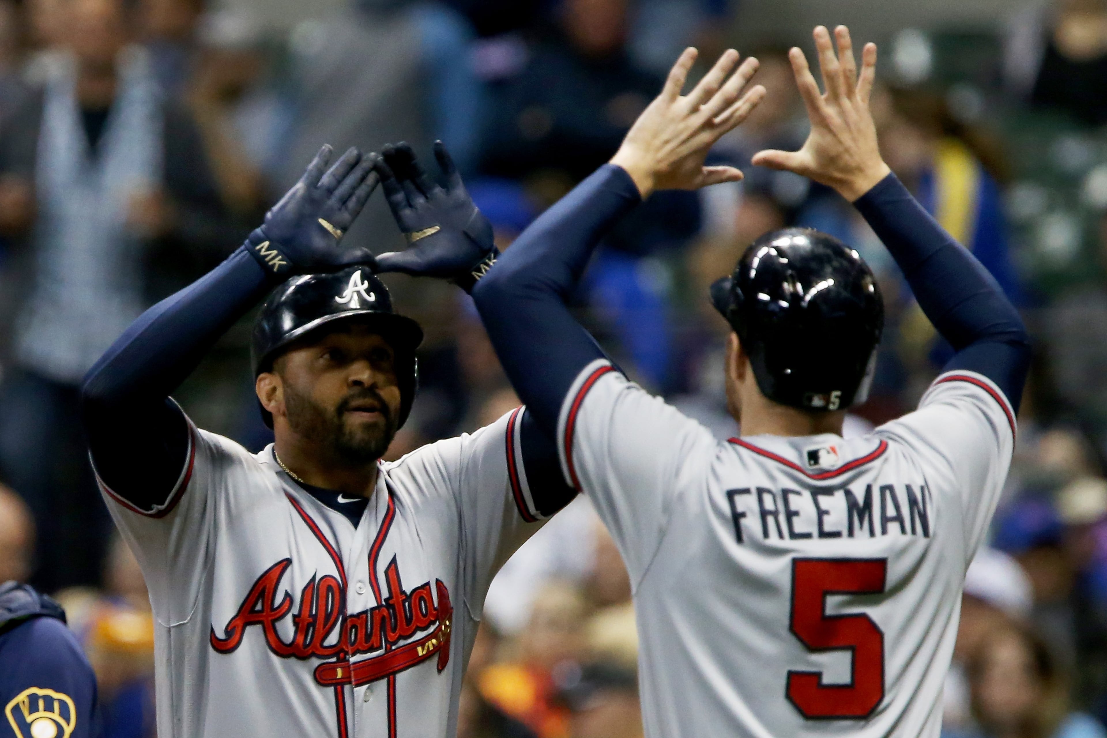 MILWAUKEE, WI - APRIL 29: Matt Kemp #27 and Freddie Freeman #5 of the Atlanta Braves celebrate after Kemp hit a home run in the fifth inning against the Milwaukee Brewers at Miller Park on April 29, 2017 in Milwaukee, Wisconsin. (Photo by Dylan Buell/Getty Images)