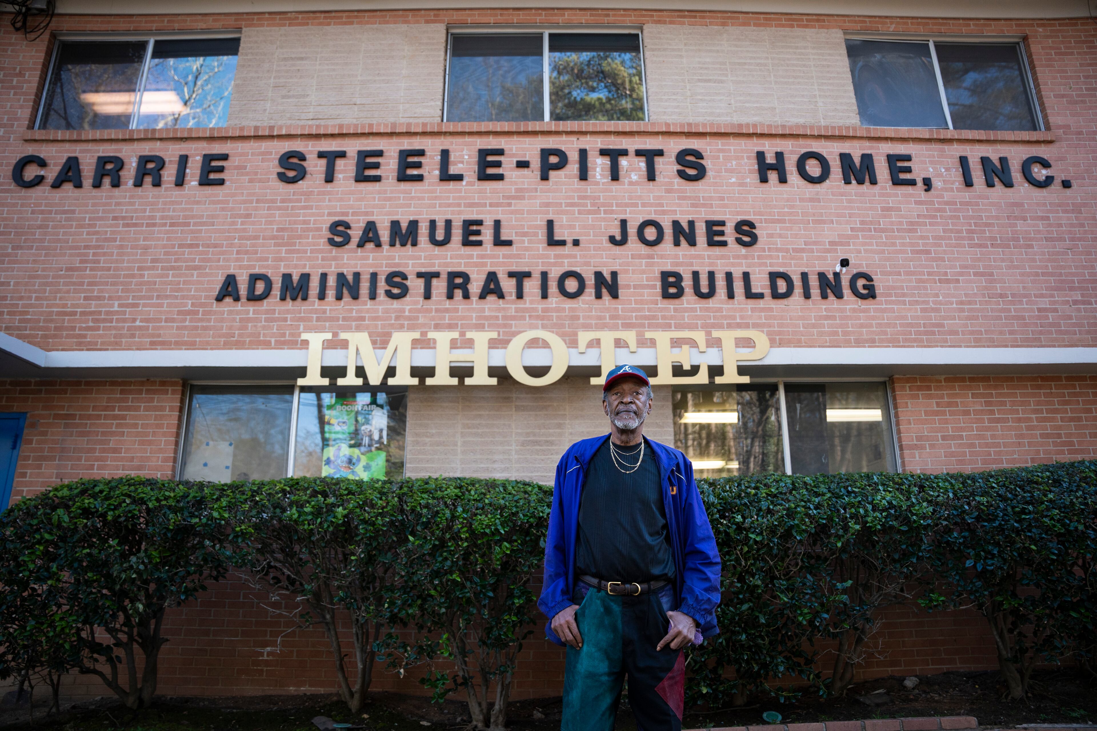 Fernando Jones stands in front of the sign at the site of the old Carrie Steele-Pitts Home in Atlanta, Georgia on Monday, Feb, 3, 2025. (Olivia Bowdoin for the AJC).