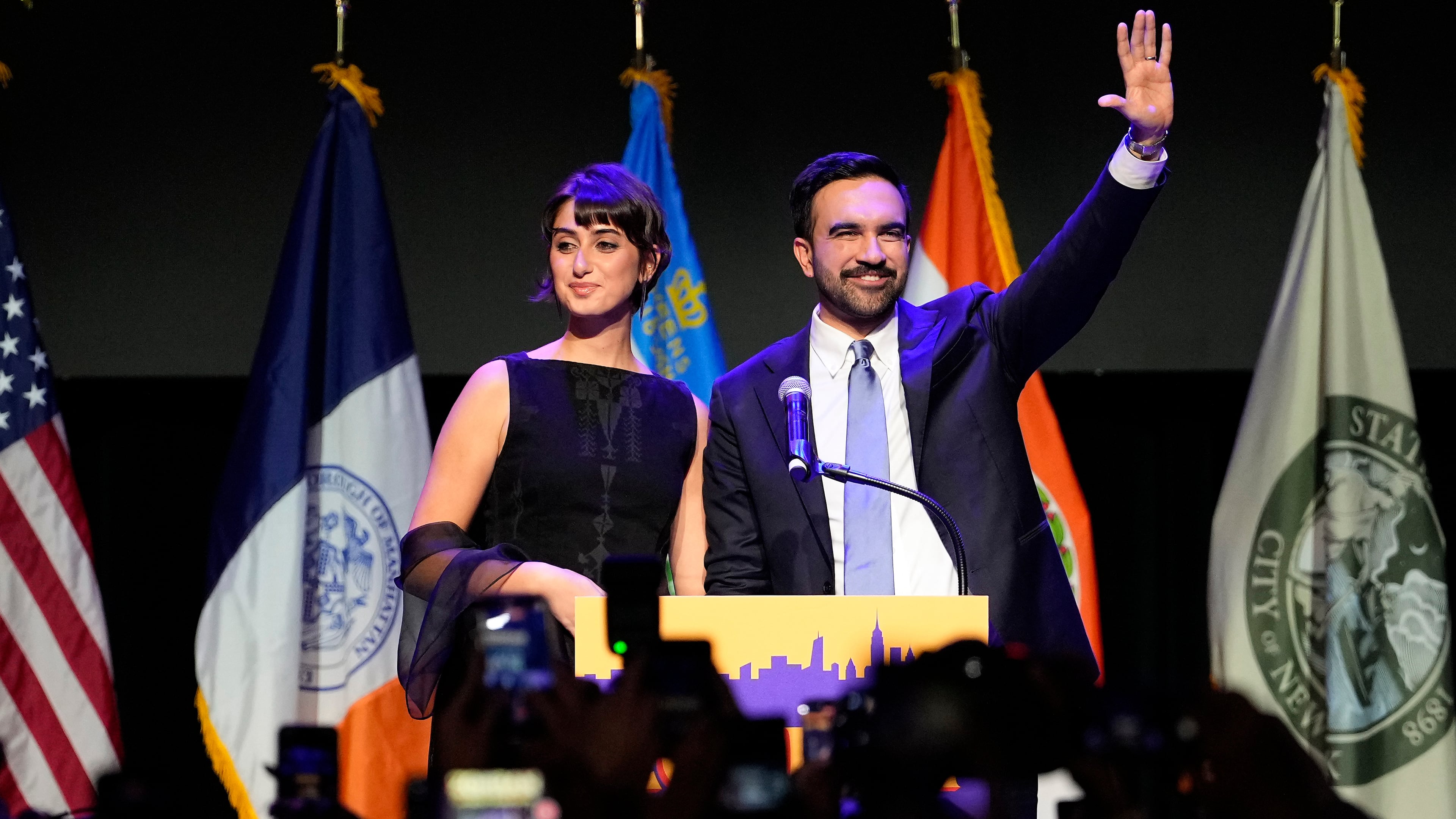 FILE - Mayor-elect Zohran Mamdani, right, and his wife, Rama Duwaji, react to supporters during an election night watch party, Nov. 4, 2025, in New York. (AP Photo/Yuki Iwamura, File)