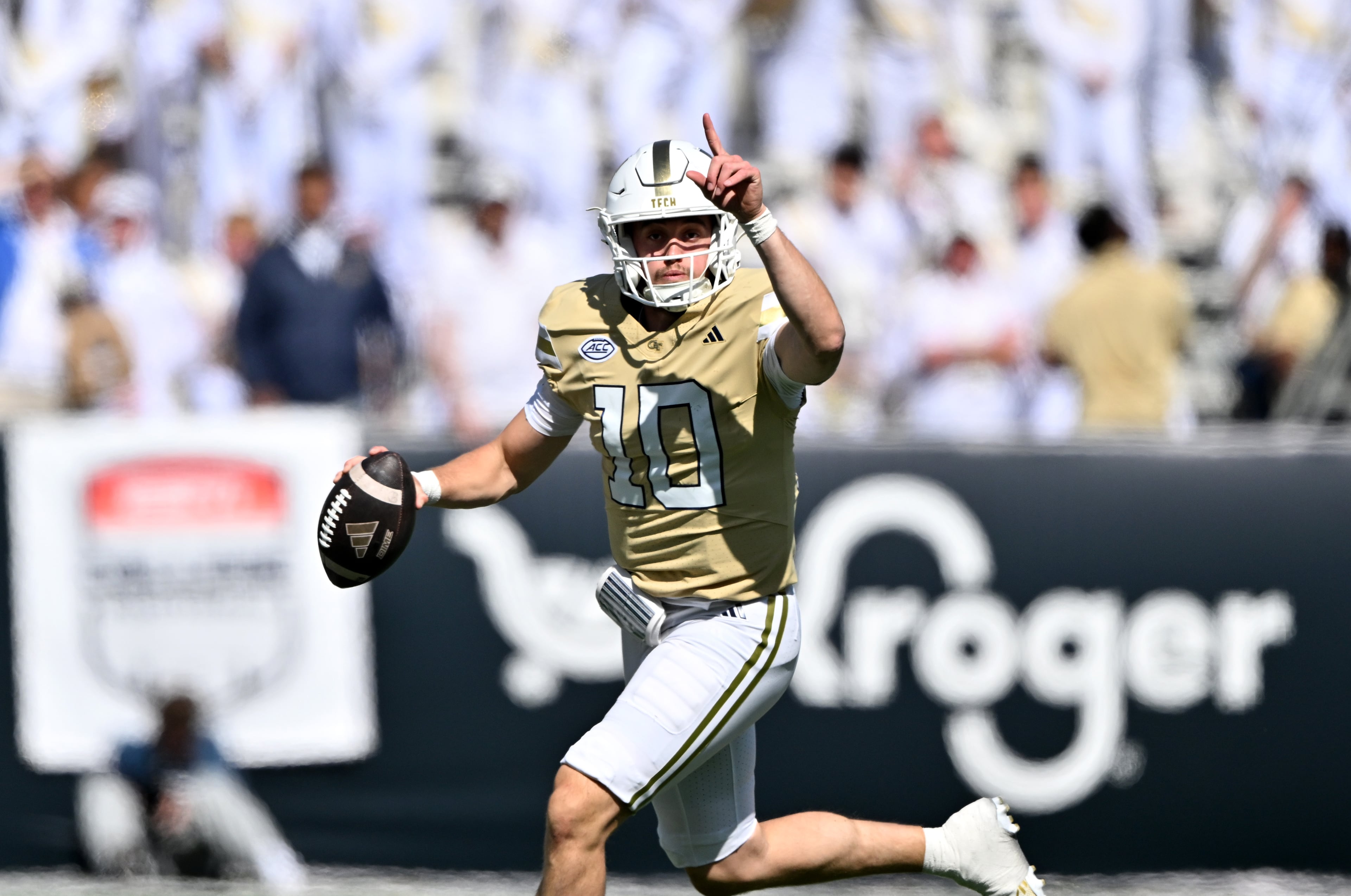Georgia Tech quarterback Haynes King runs the ball against Syracuse defensive back Braheem Long Jr. (0) during the first half of an NCAA college football game at Bobby Dodd Stadium, Saturday, Oct. 25, 2025 in Atlanta. (Hyosub Shin/AJC)