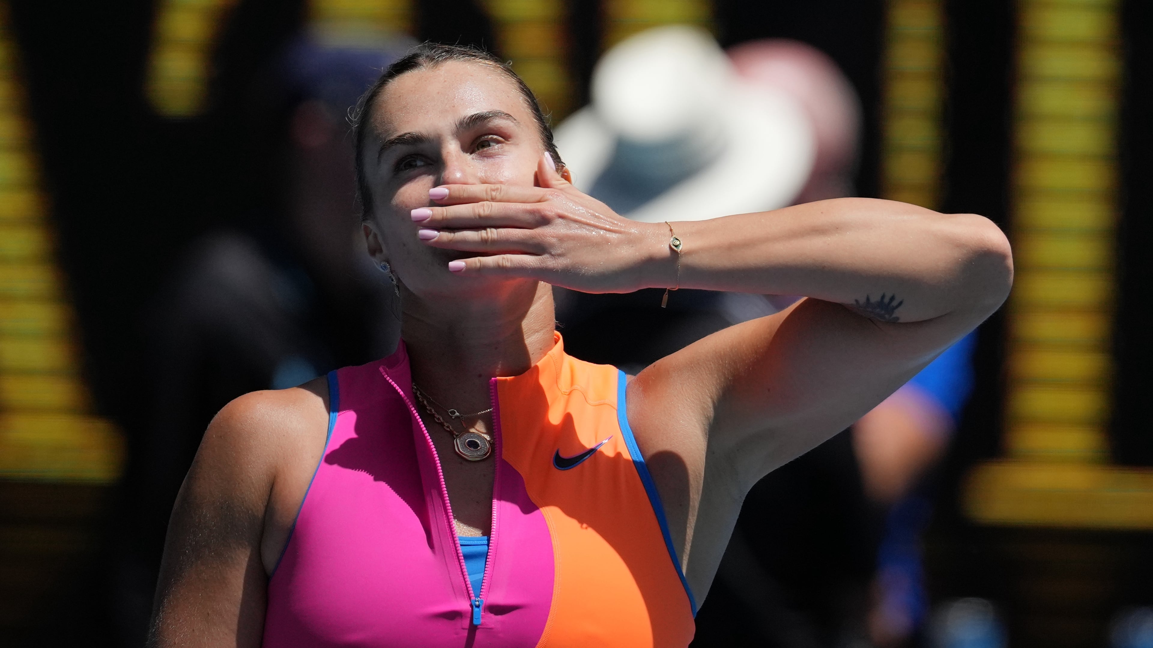 Aryna Sabalenka of Belarus celebrates after defeating Victoria Mboko of Canada in their fourth round match at the Australian Open tennis championship in Melbourne, Australia, Sunday, Jan. 25, 2026. (AP Photo/Dita Alangkara)