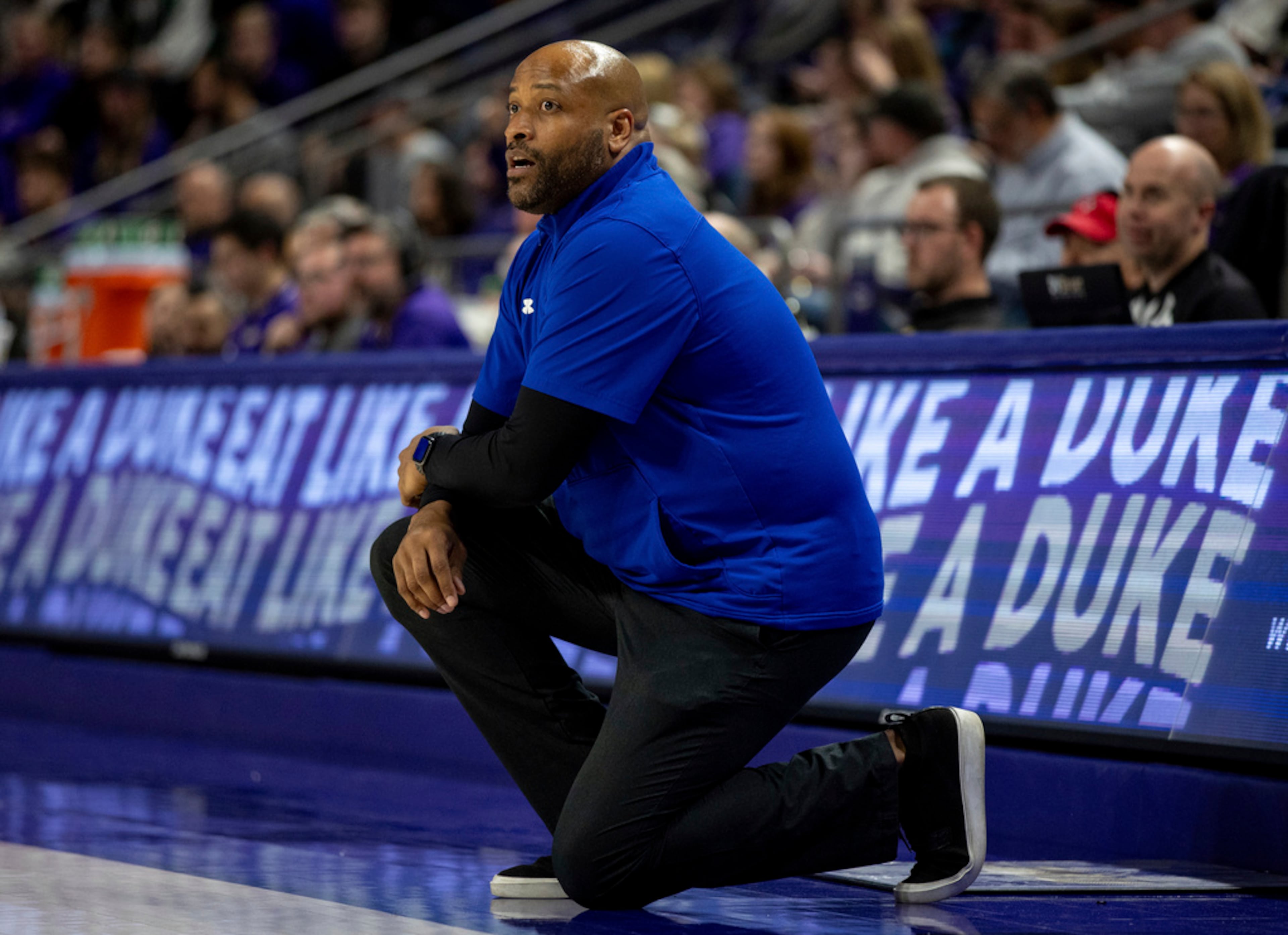 Georgia State coach Jonas Hayes watches play during the first half of the team's NCAA college basketball game against James Madison in Harrisonburg, Va., Thursday, Feb. 15, 2024. James Madison won 83-63. (Daniel Lin/Daily News-Record via AP)