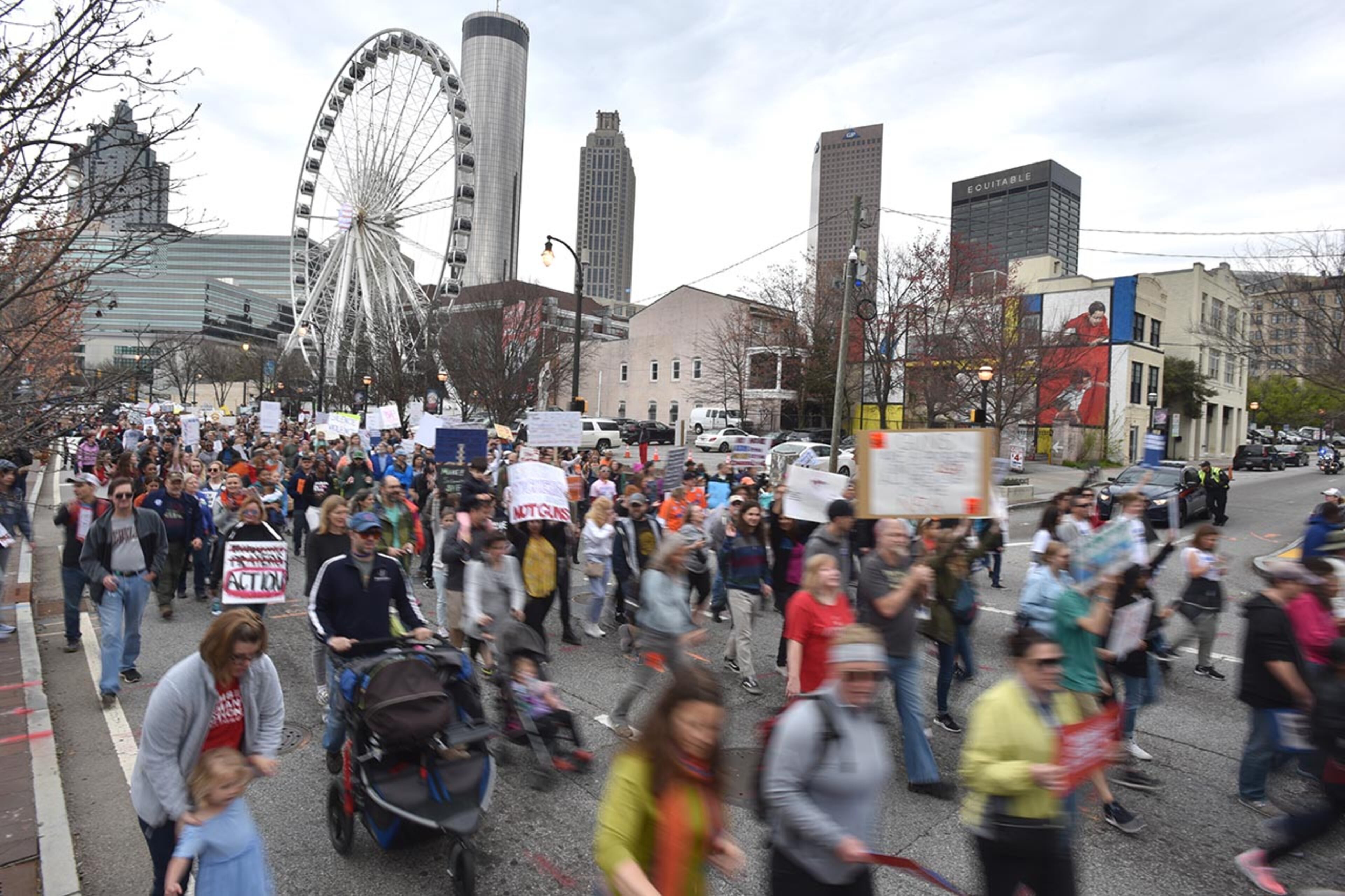 March 24, 2018 Atlanta - Thousands of people march to Liberty Plaza during the March For Our Lives rally in downtown Atlanta on Saturday, March 24, 2018. Atlanta police estimated the crowd at near 30,000 for todayâÃôs March for Our Lives. People of all ages were drawn to one of the nationwide demonstrations in a movement begun by student survivors of last monthâÃôs mass killing in a Parkland, Fla., school. Some of those Florida students were among the speakers in Atlanta. HYOSUB SHIN / HSHIN@AJC.COM