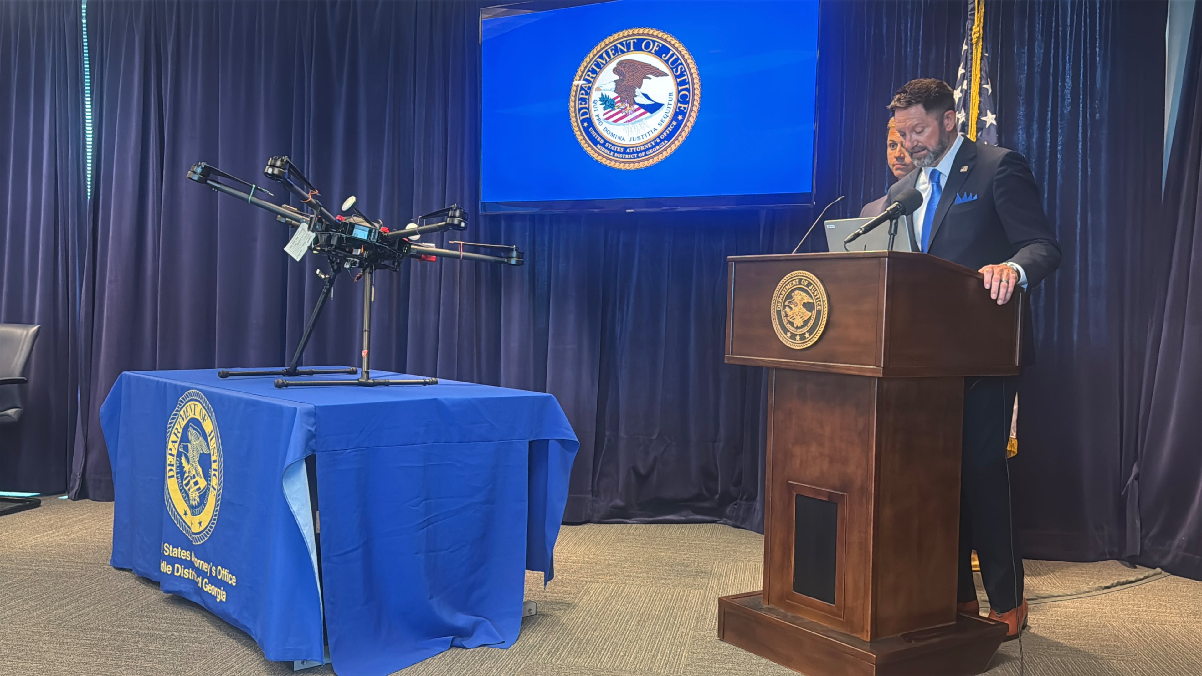 William K. Marshall III, director of the Bureau of Prisons, announced Wednesday in Macon the indictments of a dozen people in an alleged smuggling operation that used drones to drop contraband into federal prisons in eight states. (Joe Kovac Jr./AJC)