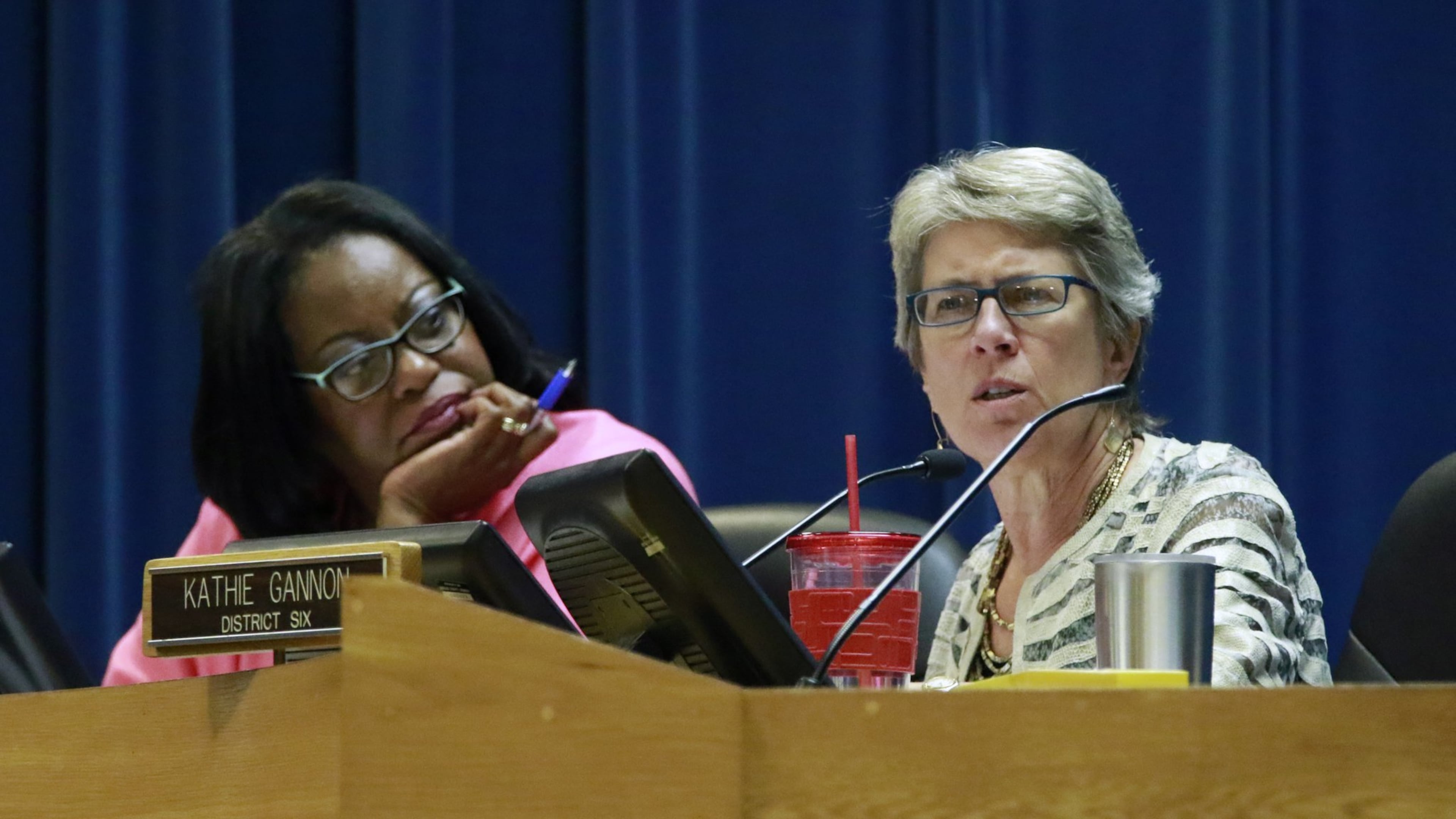 The DeKalb County Board of Commissioners approved a $1.38 billion midyear budget Tuesday. Pictured are Commissioners Mereda Davis Johnson and Kathie Gannon. BOB ANDRES / BANDRES@AJC.COM.