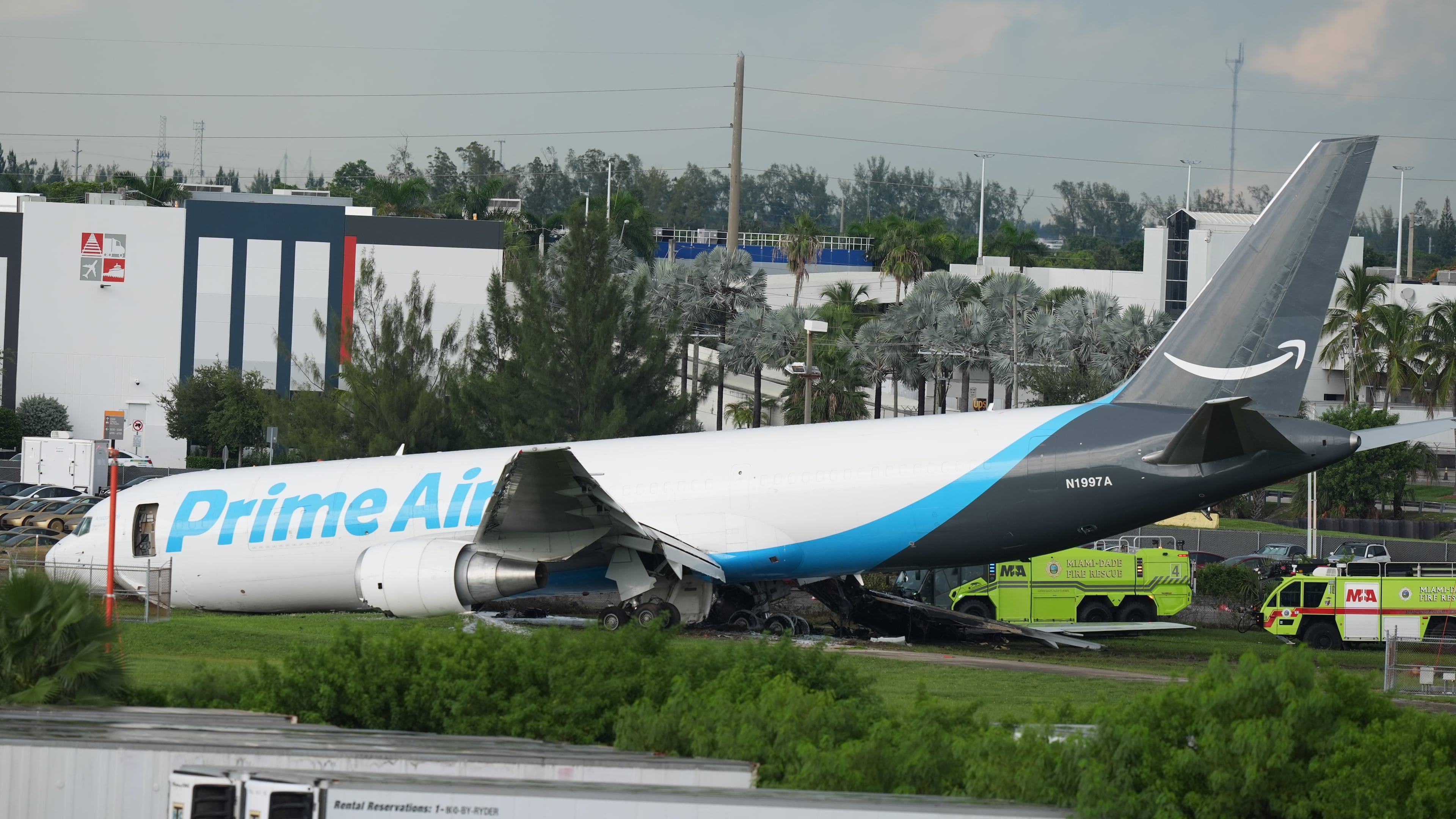An Amazon cargo plane sits at the Miami International Airport (MIA) after it overshot the runway, Sunday, Sept. 6, 2026. (AP Photo/Lynne Sladky)