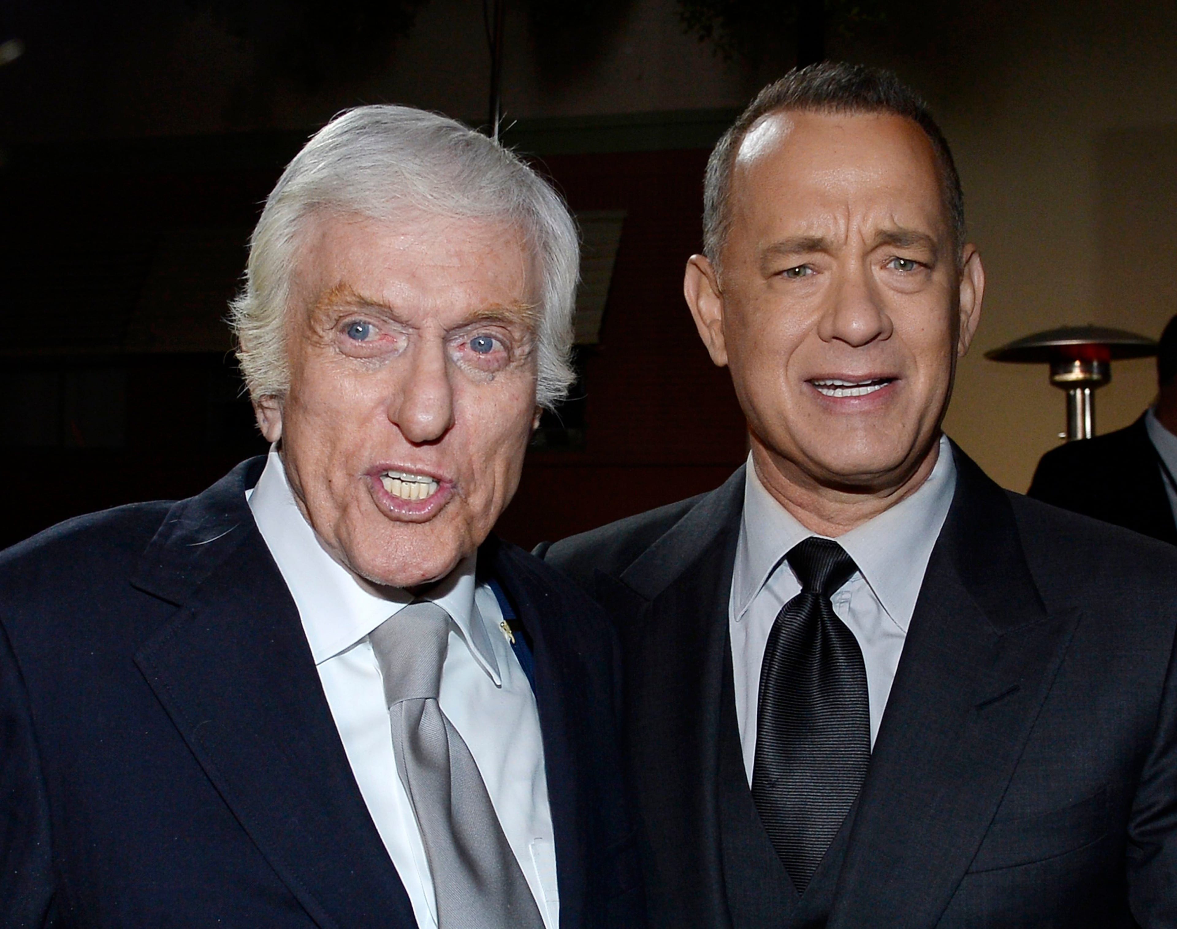 Cast member Tom Hanks (R) and actor Dick Van Dyke attend the film premiere of "Saving Mr. Banks" at the Walt Disney Studios in Burbank, California, December 9, 2013. REUTERS/Kevork Djansezian (UNITED STATES - Tags: ENTERTAINMENT)