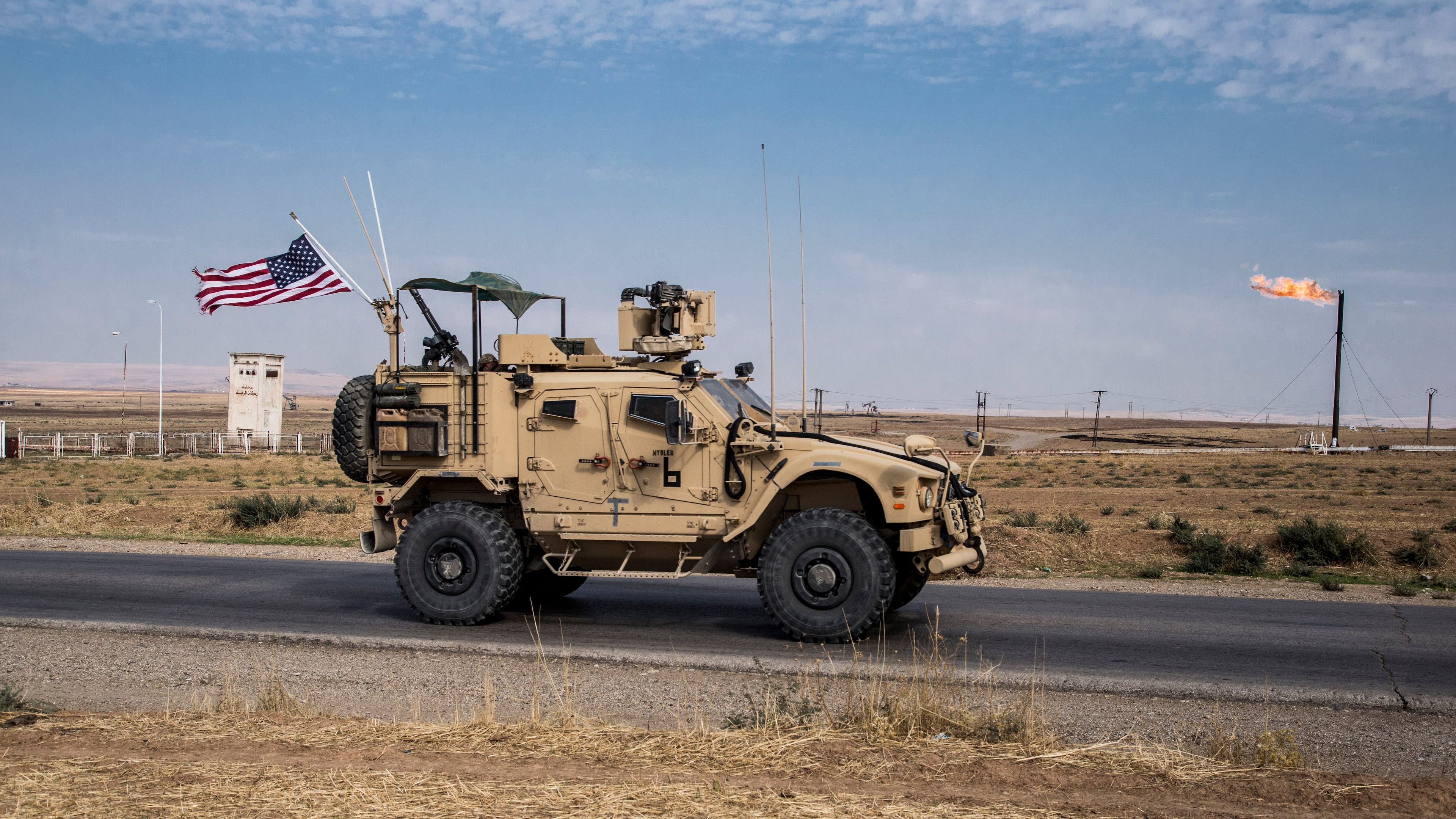 U.S. forces patrol Syrian oil fields on Oct. 28. The Pentagon is increasing U.S. efforts to protect Syria's oil fields from the extremist group as well as from Syria itself and the country's Russian allies.