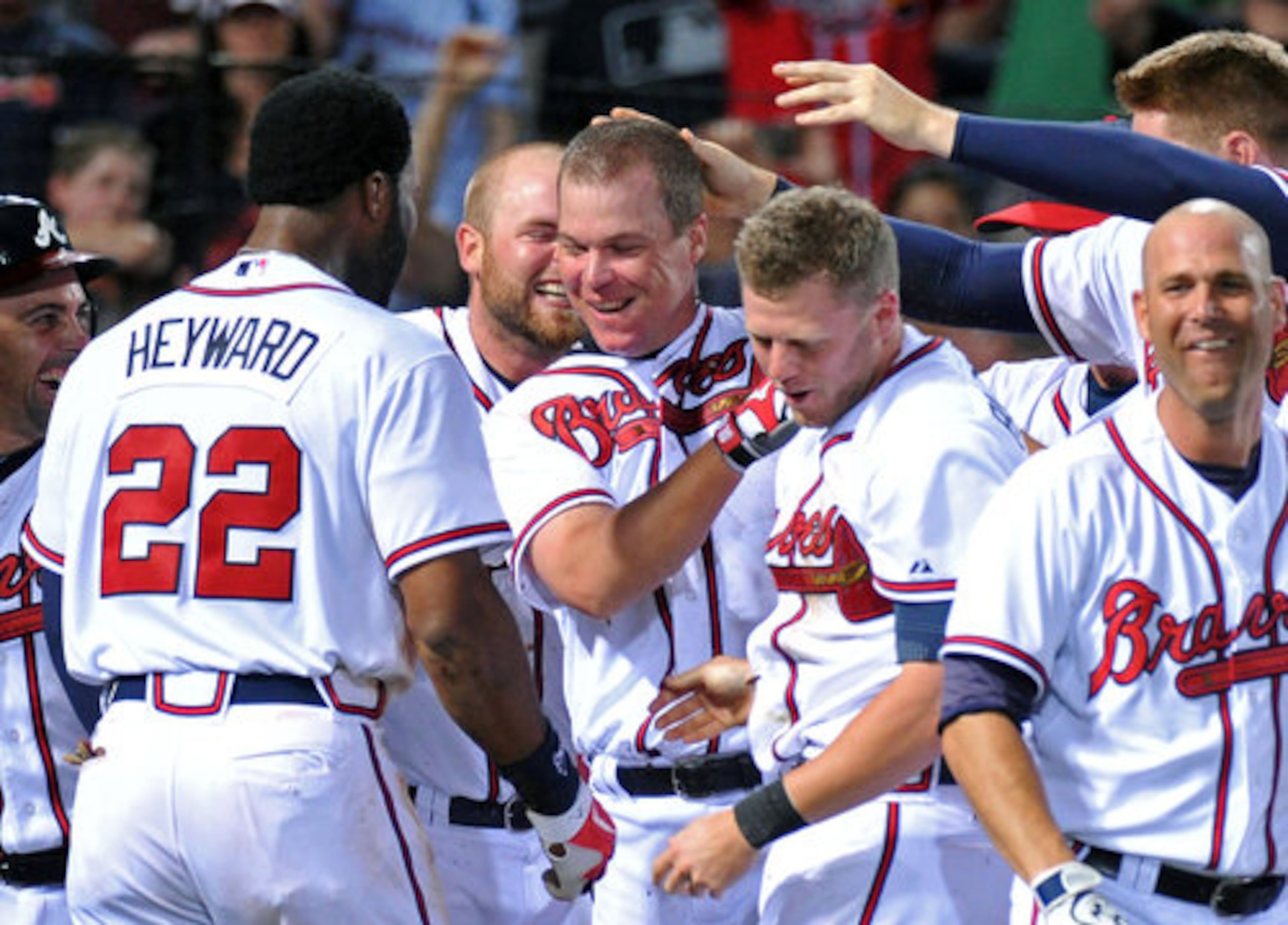 May 2: Chipper Jones is mobbed at the plate after ending a seesaw battle with the Phillies at Turner Field in the 11th inning with a two-run home run - his 458th in the majors. Jones' homer ended the Braves' eight-game losing streak to the Phillies, dating back to last season. He said the homer will hold a special place on his career highlights. "That's right up there just because the team that we're kind of shooting for in the division obviously is the Phillies," said Jones.