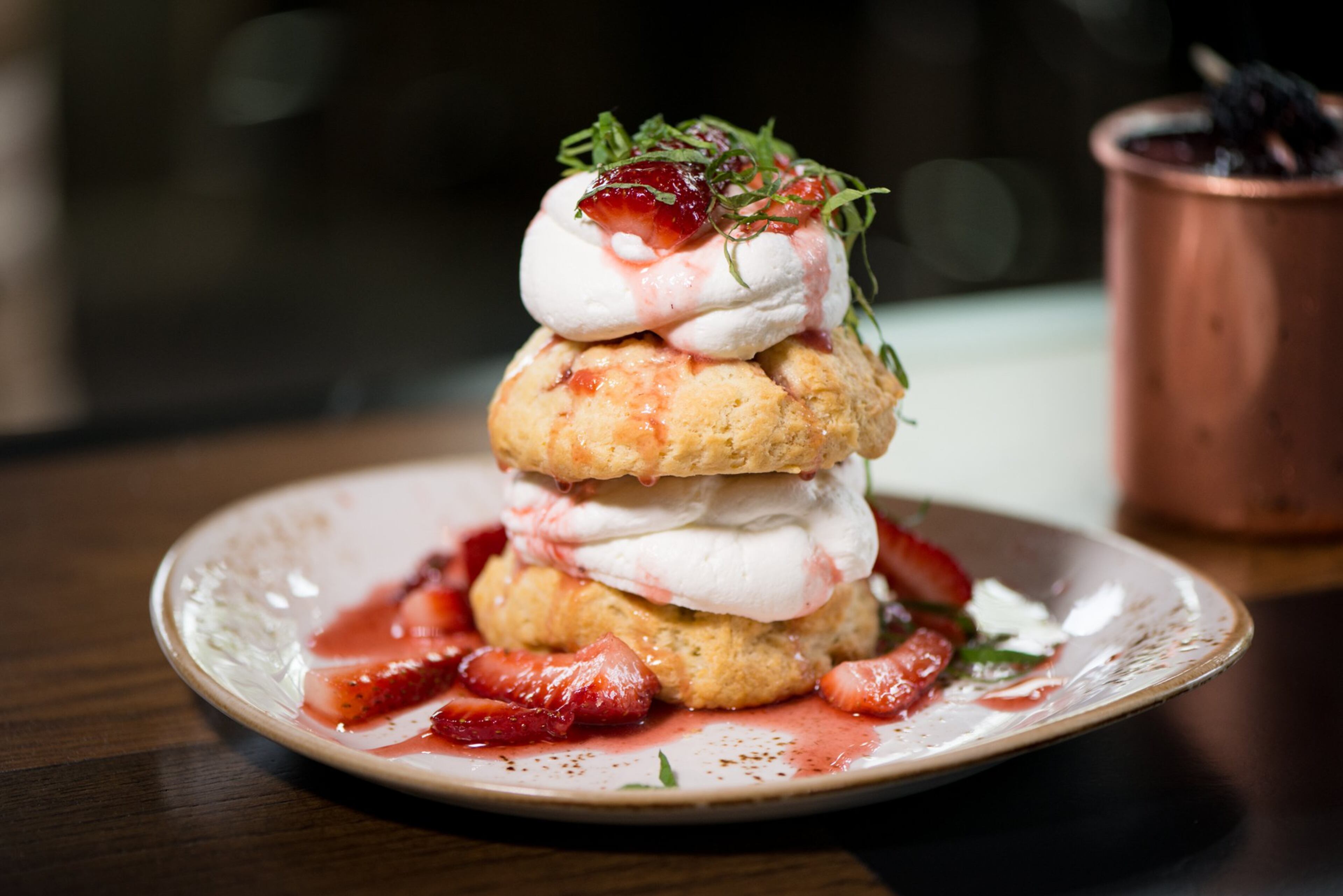 Strawberry Shortcake with macerated strawberries, whipped cream, and mint. Photo credit- Mia Yakel.