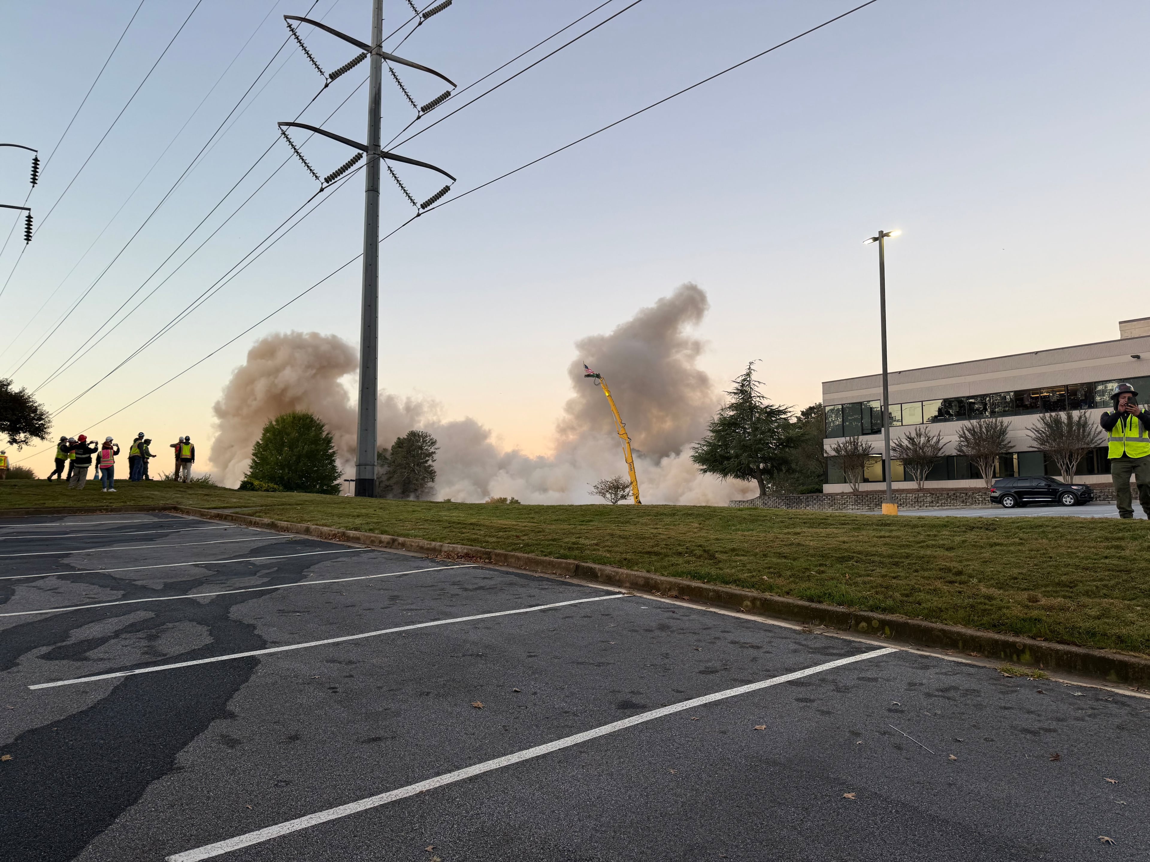 Dust wafts up from the recently razed site of a Chamblee office tower on Saturday, Oct. 24, 2026. (Savannah Sicurella/AJC)
