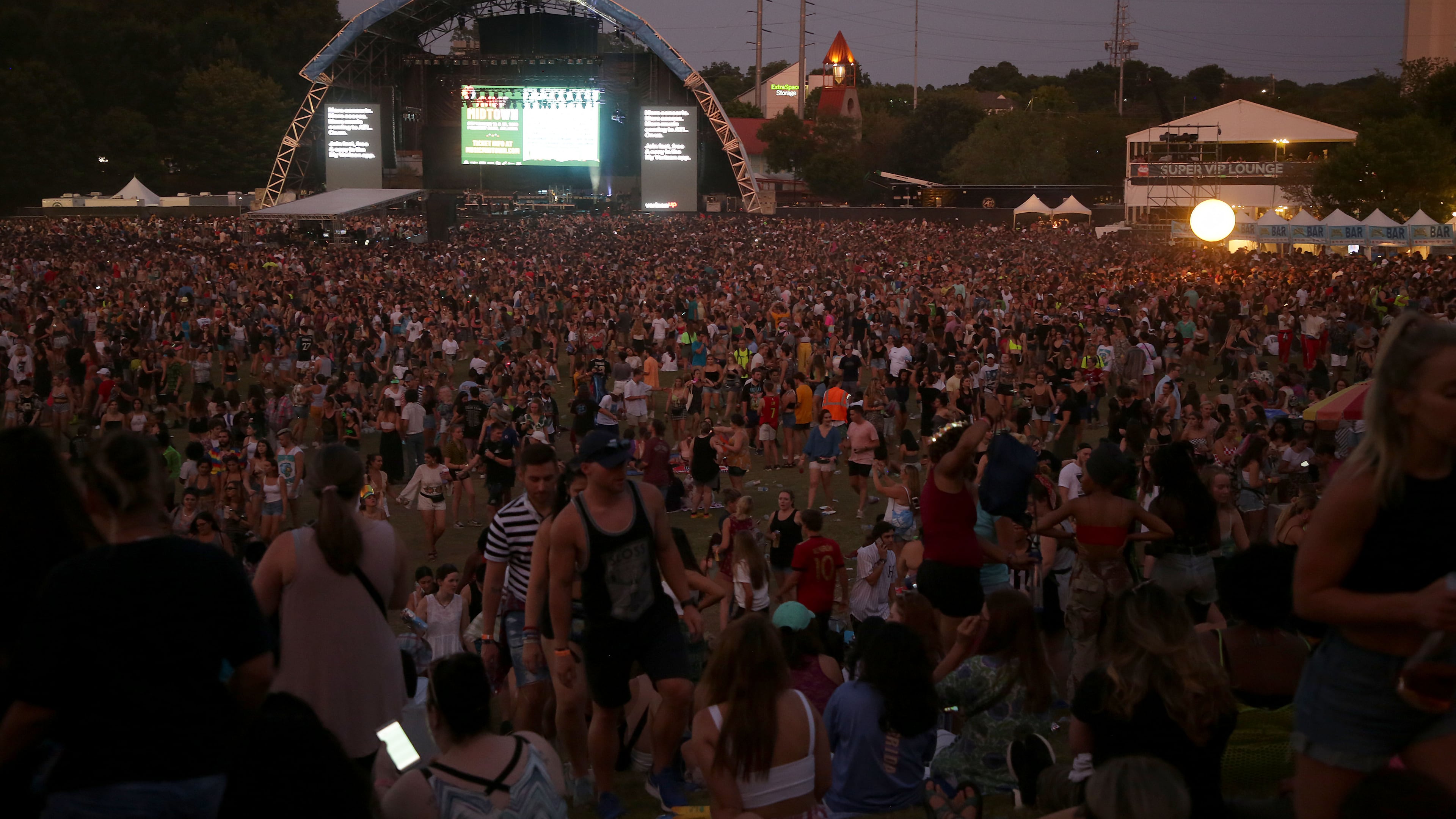 ATLANTA- September 15, 2019 -- Crowds blanket the fields of Music Midtown between stages and various performances as the sun sets on the final day of the Music Midtown Festival in Atlanta, Sunday, September 15, 2019. (Special to the AJC/Akili-Casundria Ramsess/Eye of Ramsess Media)