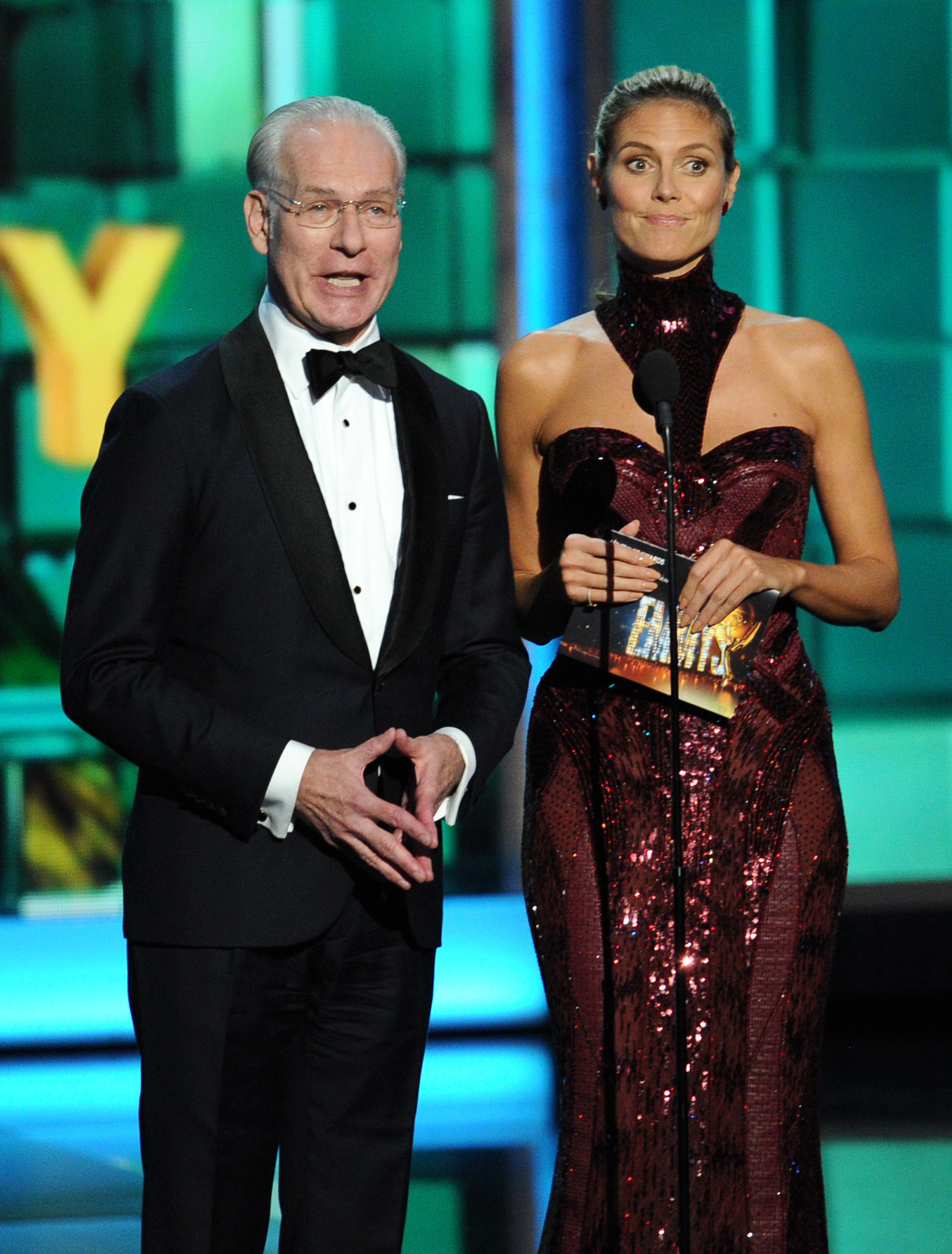 LOS ANGELES, CA - SEPTEMBER 22: TV personalities Tim Gunn (L) and Heidi Klum speak onstage during the 65th Annual Primetime Emmy Awards held at Nokia Theatre L.A. Live on September 22, 2013 in Los Angeles, California. (Photo by Kevin Winter/Getty Images)