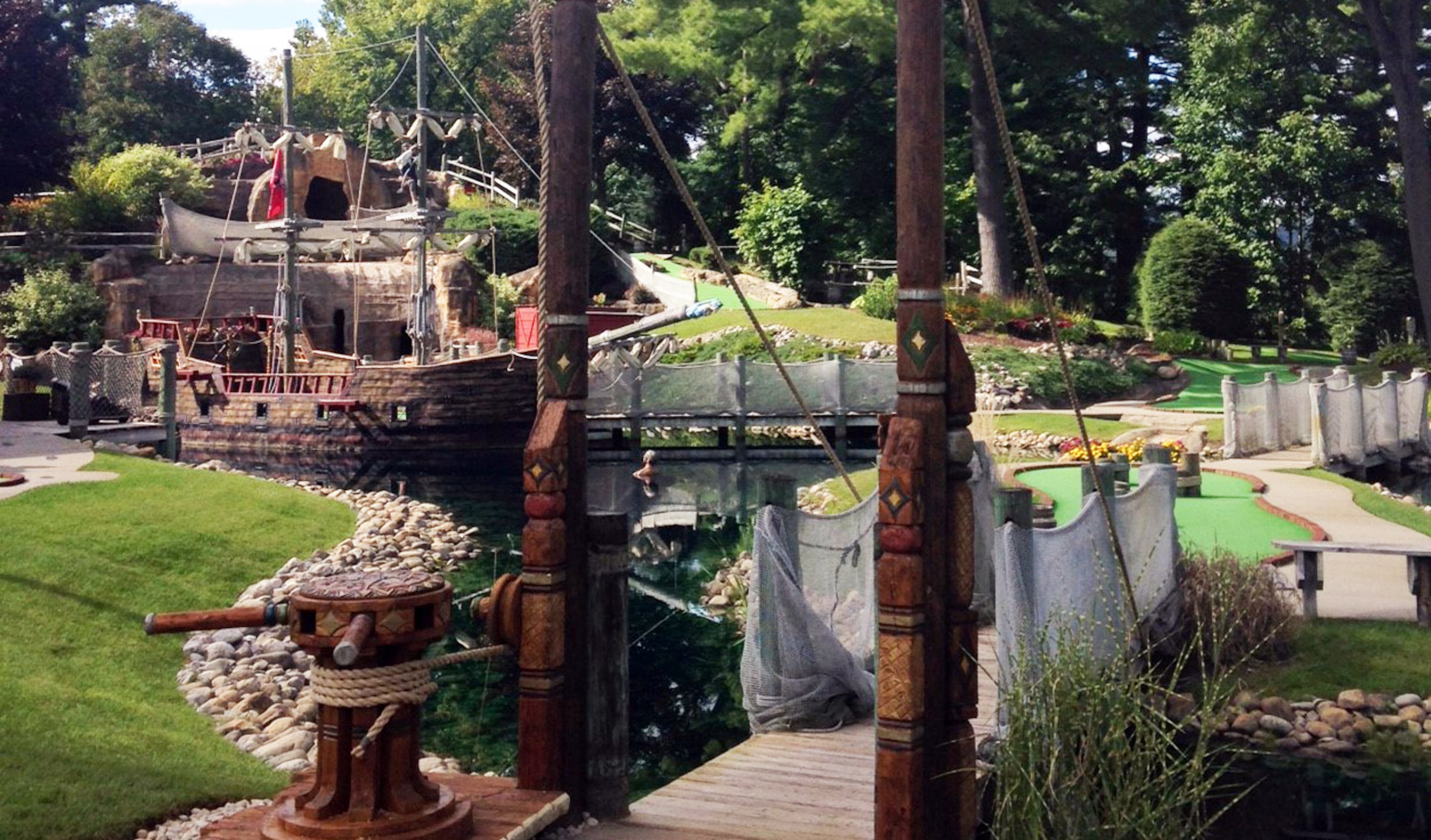 Pirate’s Cove Adventure Golf in Duluth presents a pirate theme that includes a full-sized ship, footbridges, waterfalls and more. (Courtesy of Pirate’s Cove)