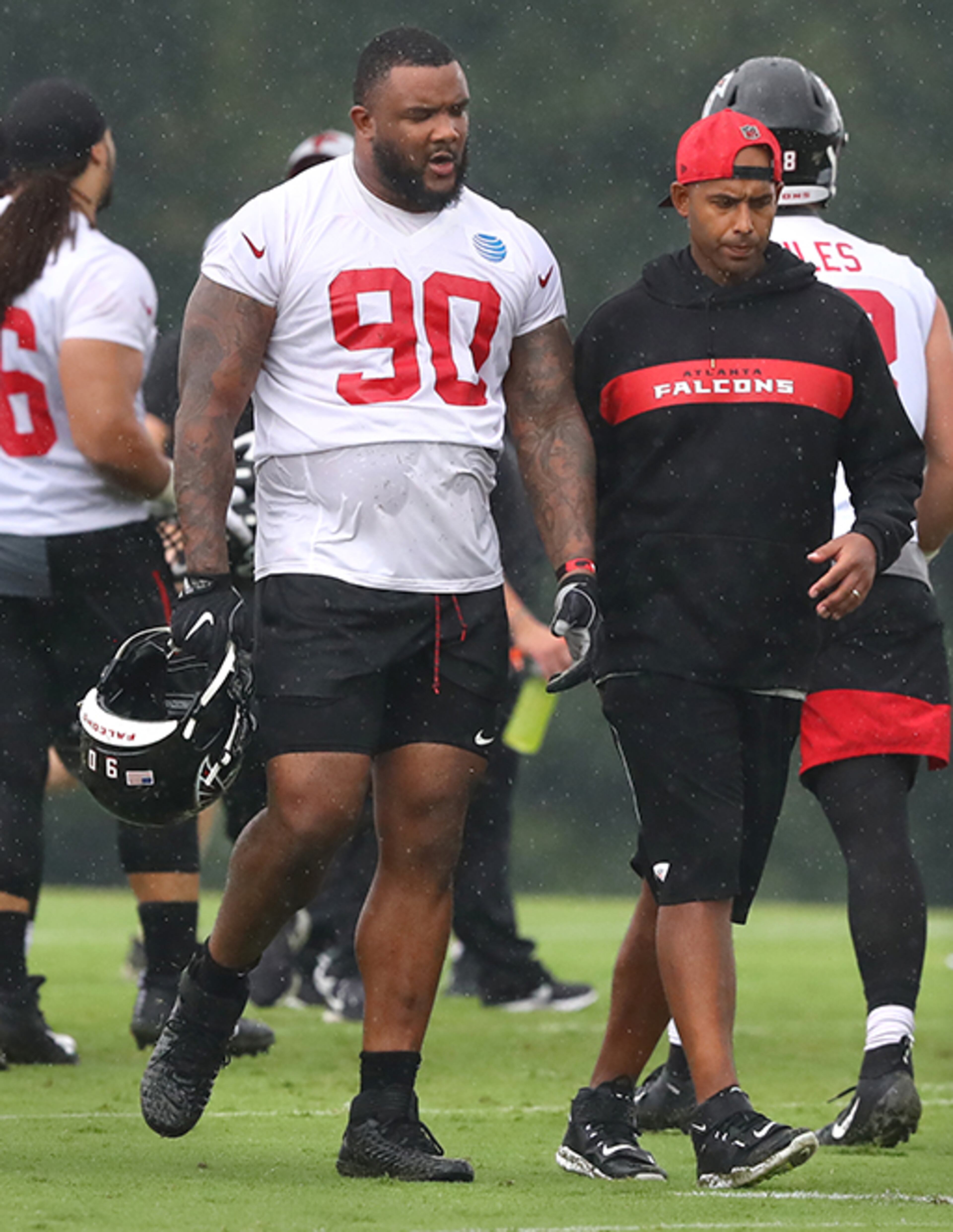 Falcons defensive tackle Ra'Shede Hageman walks off field during the second day of training camp Tuesday, July 23, 2019, in Flowery Branch.