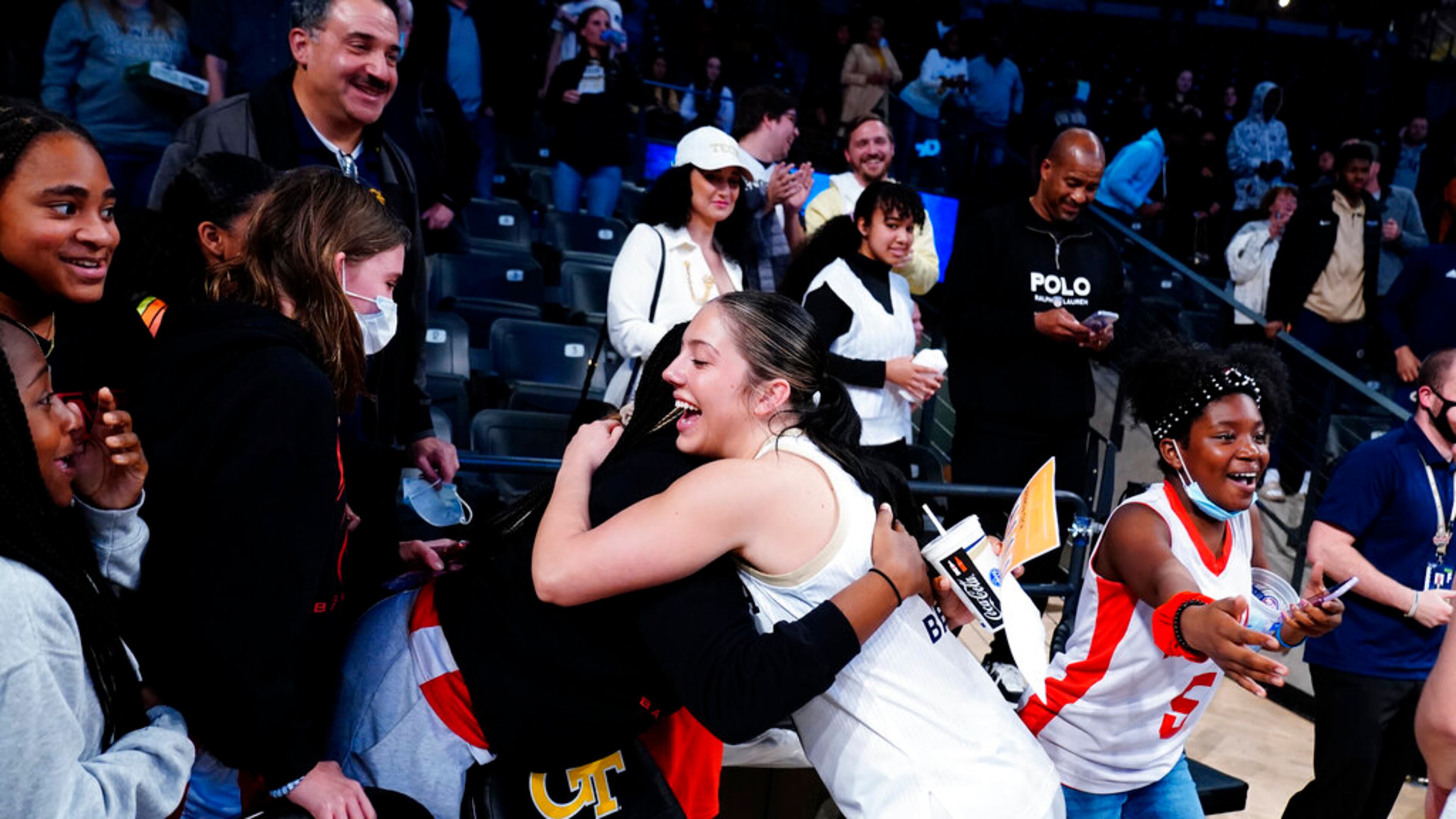 Georgia Tech guard Sarah Bates (3) celebrates with fans after the team's win over Connecticut in an NCAA college basketball game Thursday, Dec. 9, 2021, in Atlanta. (AP Photo/John Bazemore)