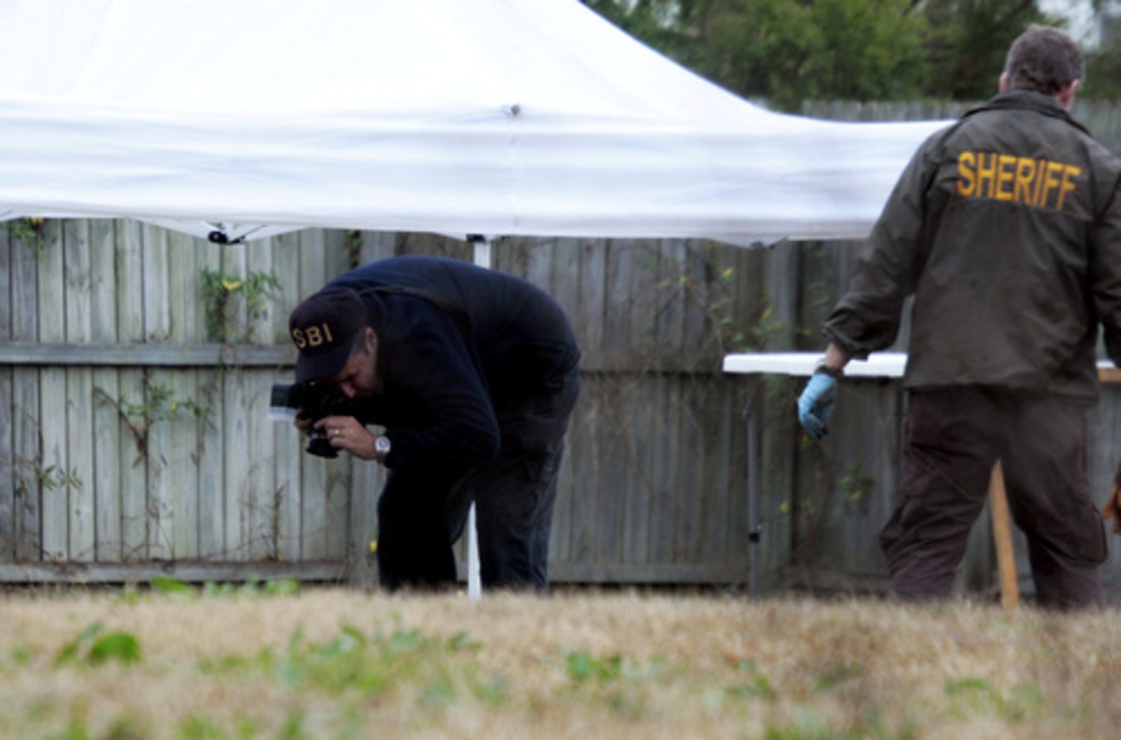 Marine Cpl. Cesar Armando Laurean's backyard was the focus of the search for the missing Maria Lauterbach on Saturday.