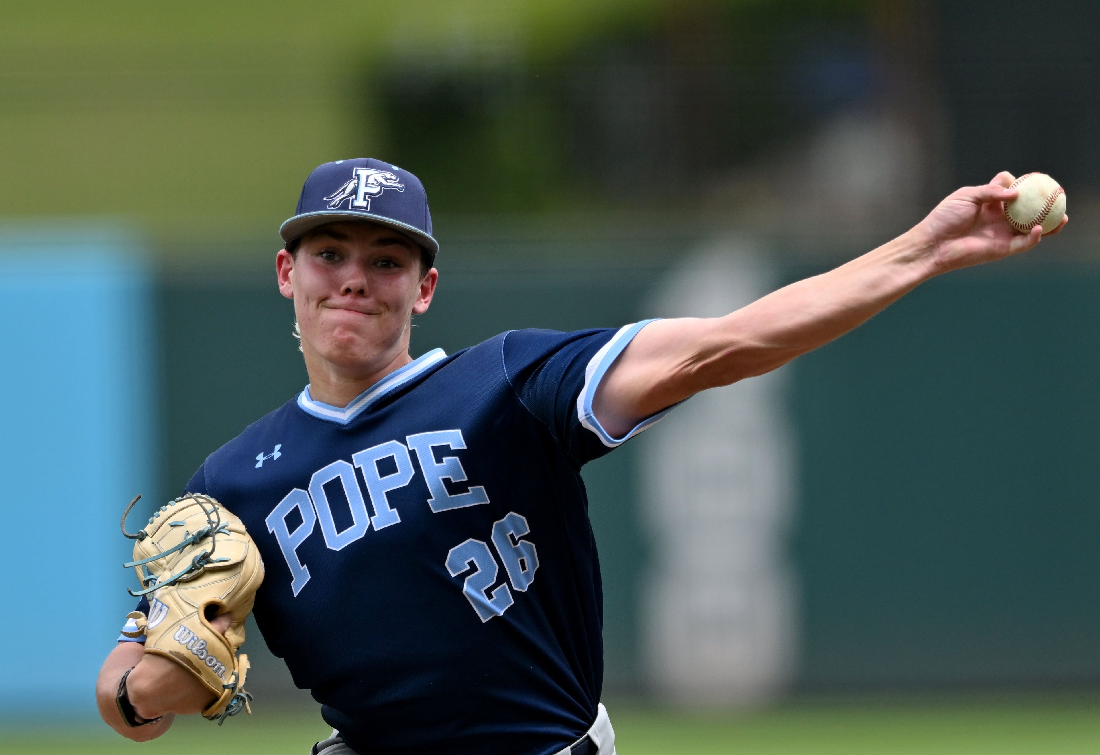 Pope's Nicolas Bobrowski throws a pitch during the fourth inning of Game 1 of the GHSA Class 5A baseball state championship series Monday, May 25, 2026, at Gwinnett Field in Lawrenceville. (Hyosub Shin/AJC)