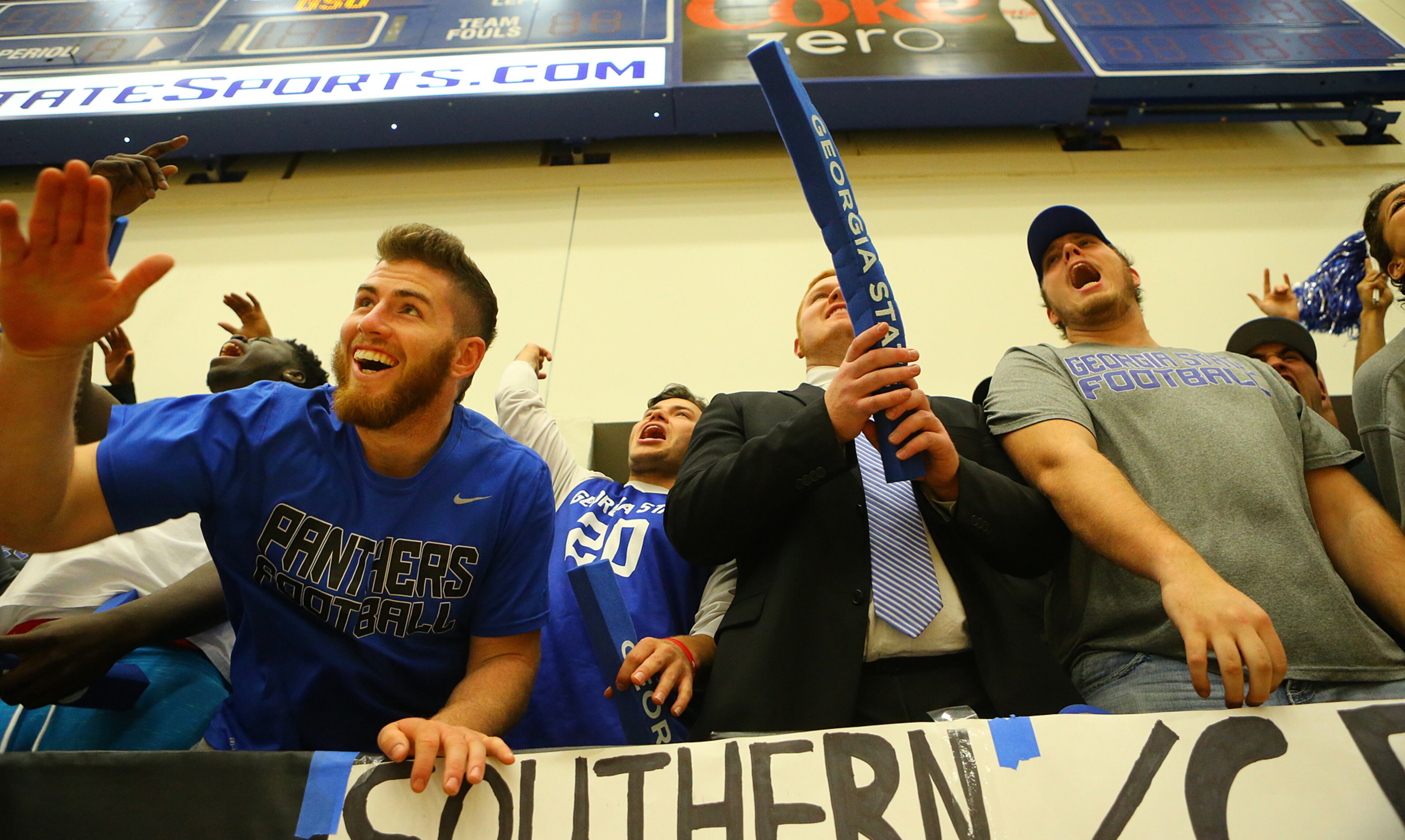 Georgia State fans cheer their team on against Georgia Southern during a basketball game on Saturday, March 7, 2015, in Atlanta.