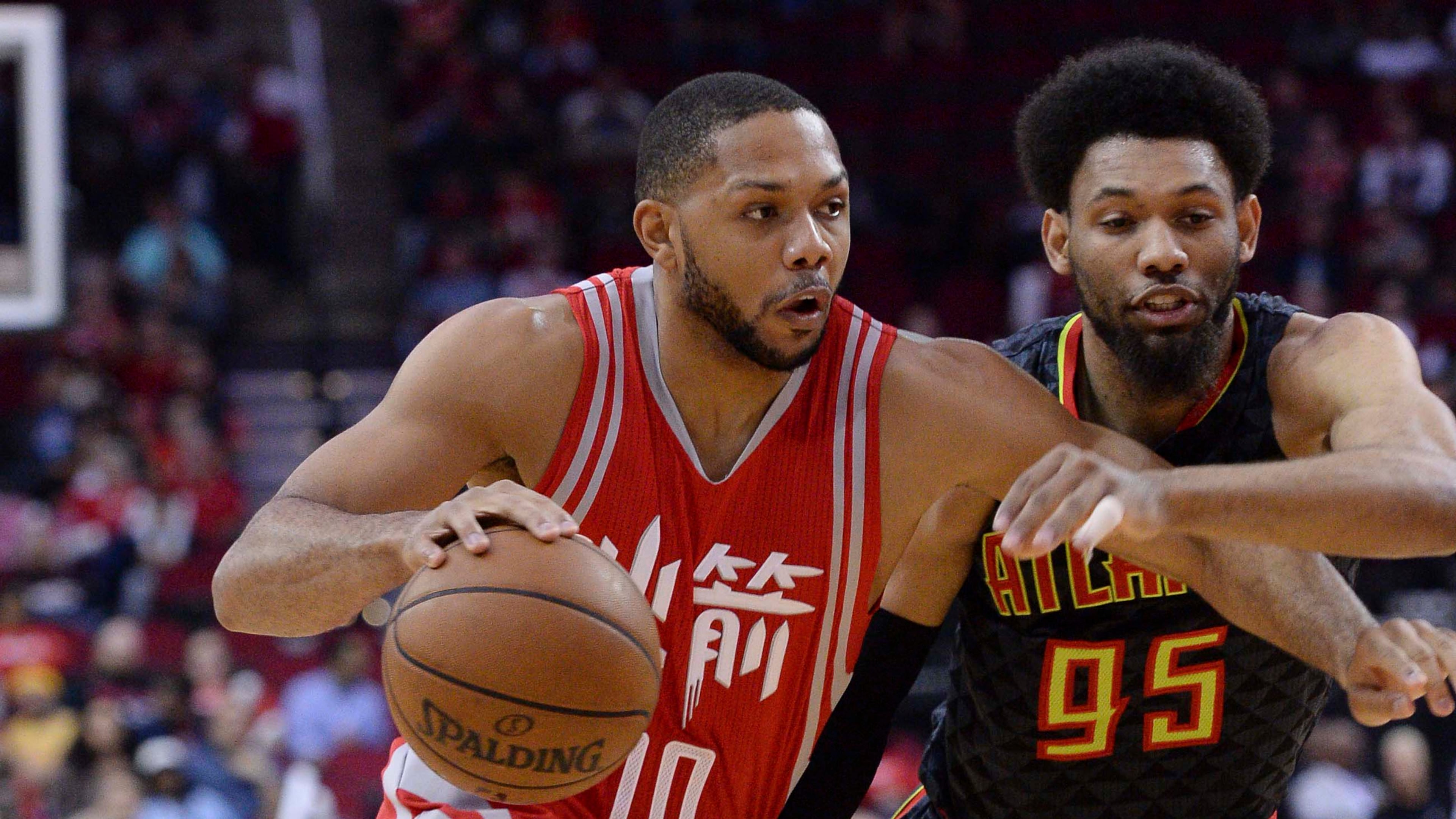 Houston Rockets guard Eric Gordon (10) drives against Atlanta Hawks forward DeAndre Bembry during the first half of an NBA basketball game Thursday, Feb. 2, 2017, in Houston. (AP Photo/George Bridges)