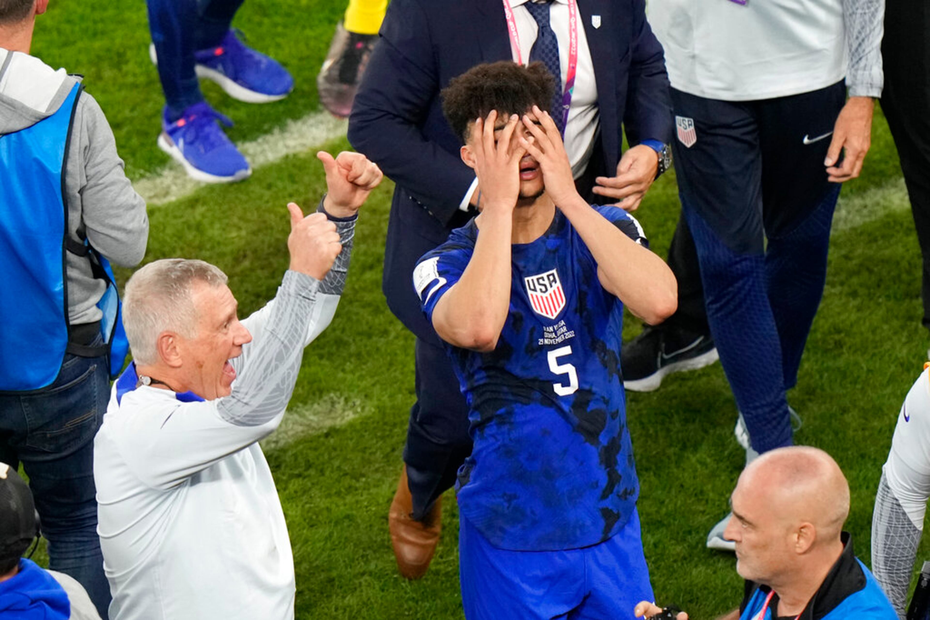 Antonee Robinson of the United States reacts at the end of the World Cup group B soccer match between Iran and the United States at the Al Thumama Stadium in Doha, Qatar, Wednesday, Nov. 30, 2022. (AP Photo/Luca Bruno)
