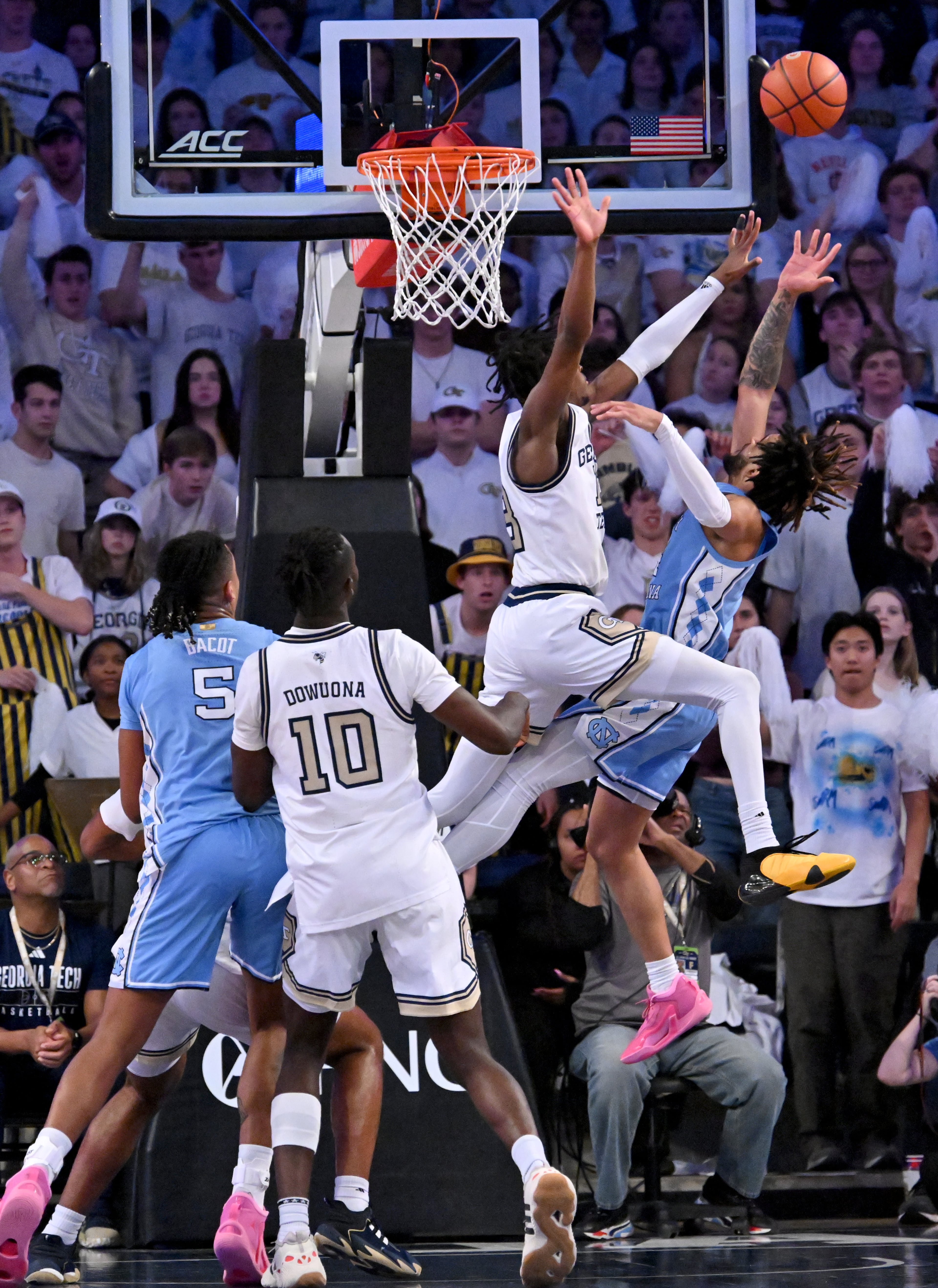 North Carolina guard RJ Davis (right) shoots against Georgia Tech guard Miles Kelly (13) during the second half of an NCAA college basketball game at Georgia Tech’s McCamish Pavilion, Tuesday, January 30, 2024, in Atlanta. Georgia Tech won 74-73 over North Carolina. (Hyosub Shin / Hyosub.Shin@ajc.com)