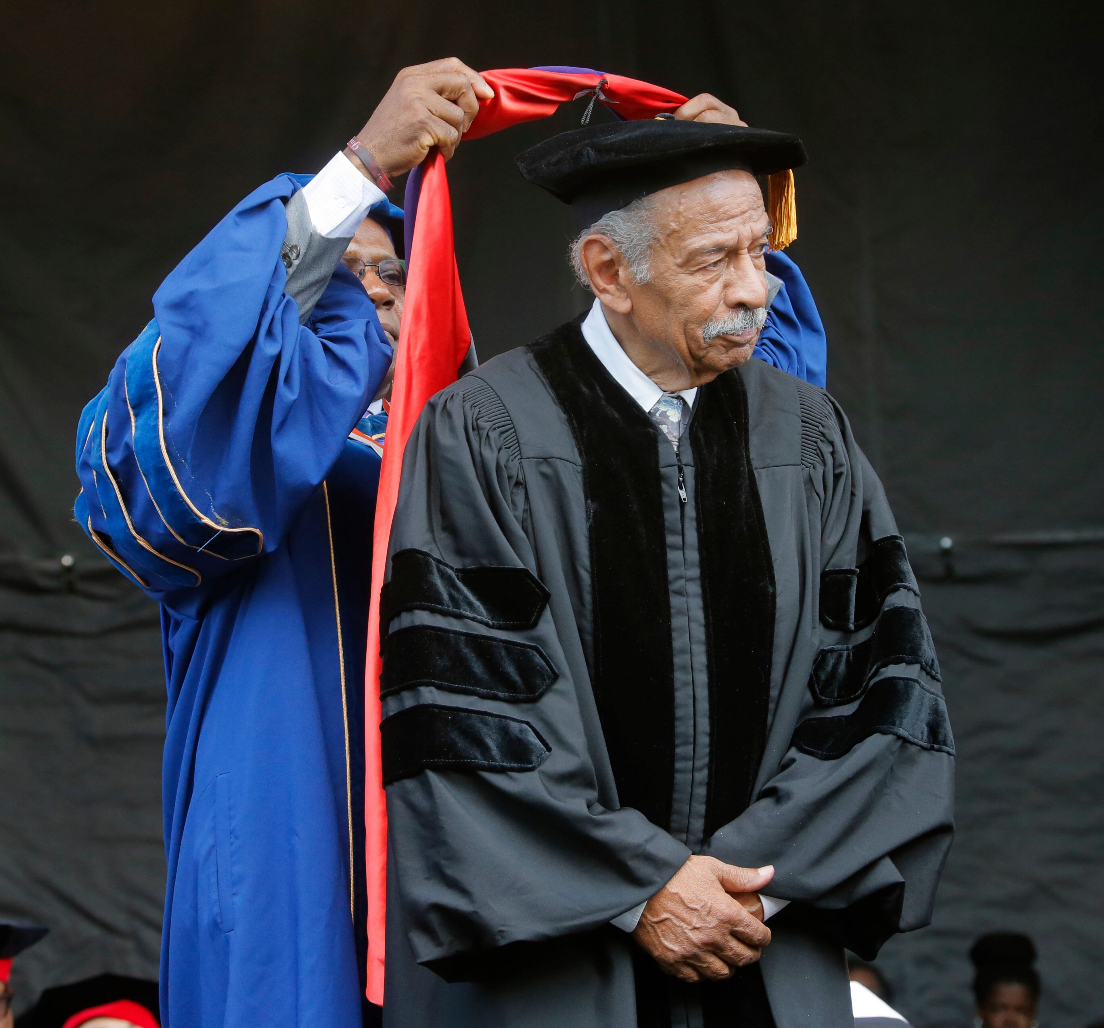 5/22/17 - Atlanta - U.S. Rep. John Conyers, Jr, receives an honorary degree. Clark Atlanta University's Panther Stadium was the site of their 28th annual Commencement. Businessman William Pickard gave the commencement address. Rev. Jesse Jackson, who received an honorary degree, also spoke. Panther Stadium, BOB ANDRES /BANDRES@AJC.COM