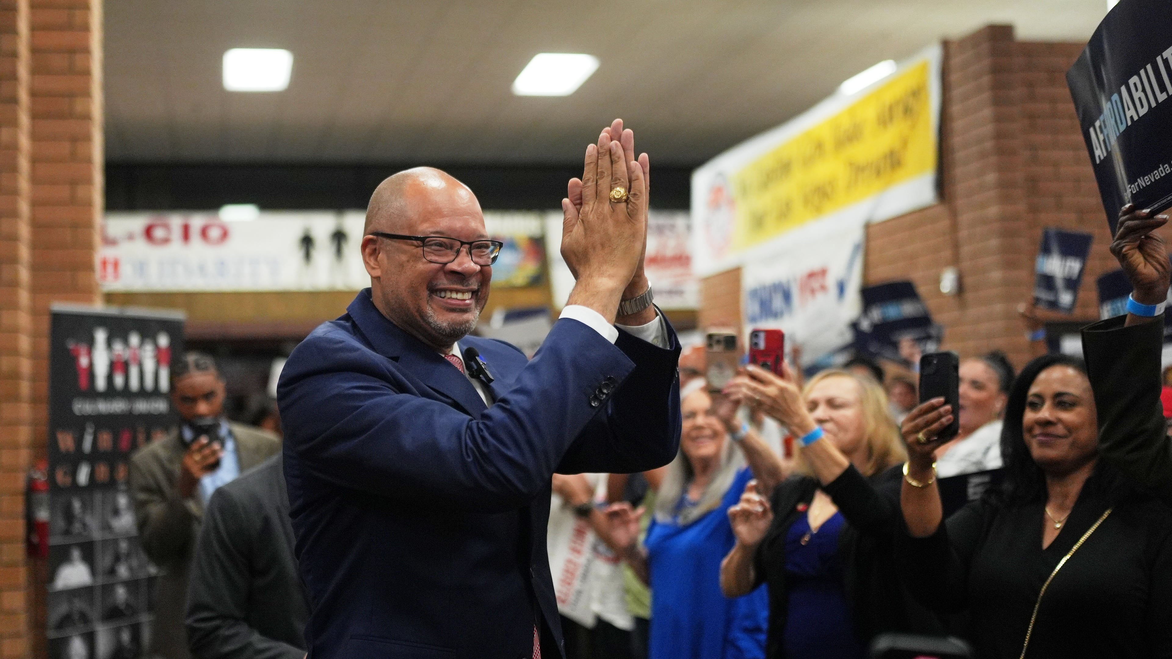 Gubernatorial candidate Aaron Ford, attorney general of Nevada, celebrates with attendees during a primary election night watch party after winning the Democratic nomination Tuesday, June 9, 2026, in Las Vegas. (AP Photo/Jae C. Hong)
