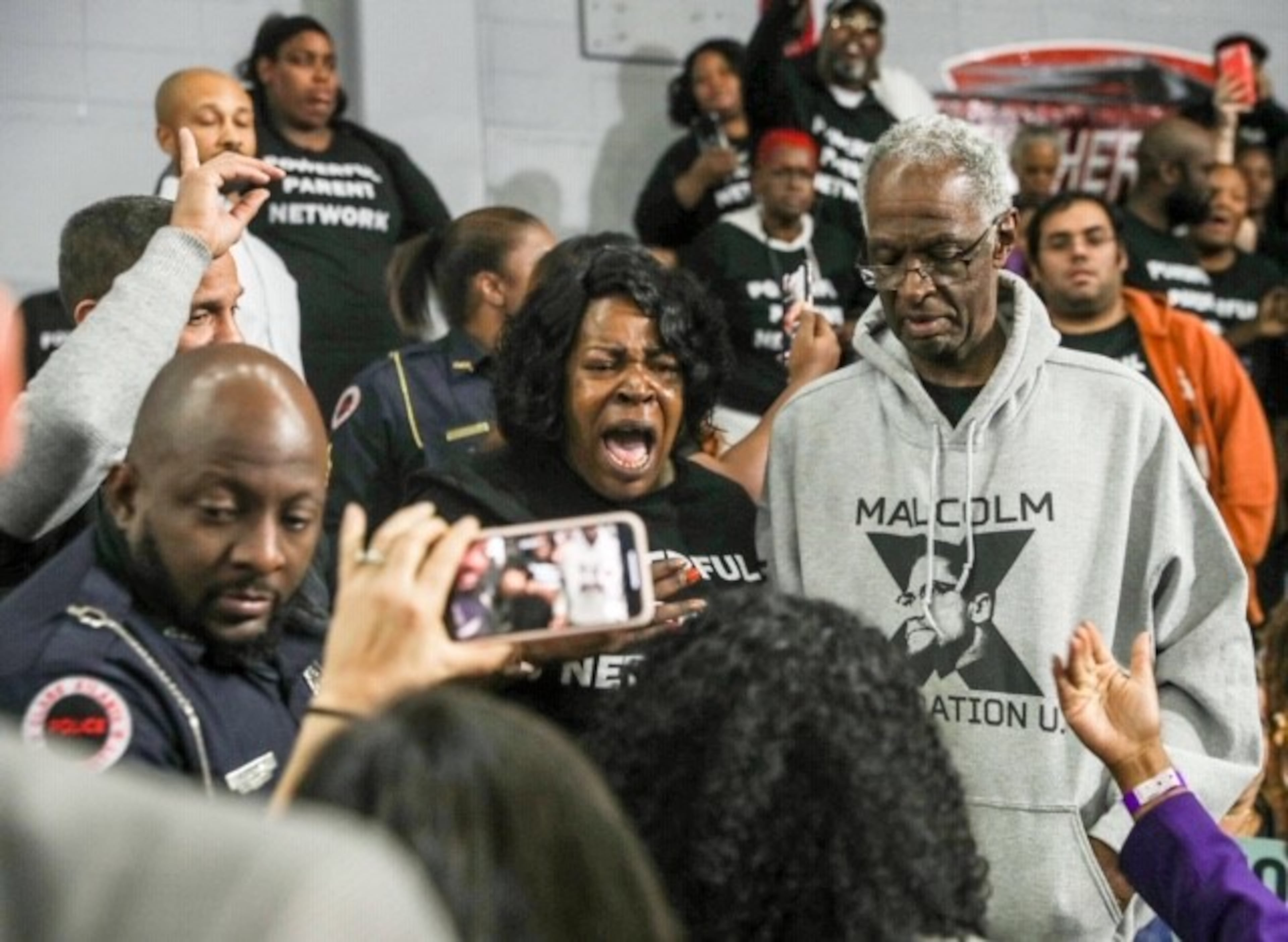 School choice activists interrupt Elizabeth Warren’s campaign rally at Clark Atlanta University on Thursday, Nov. 21, 2019. (Alyssa Pointer/The Atlanta Journal-Constitution)