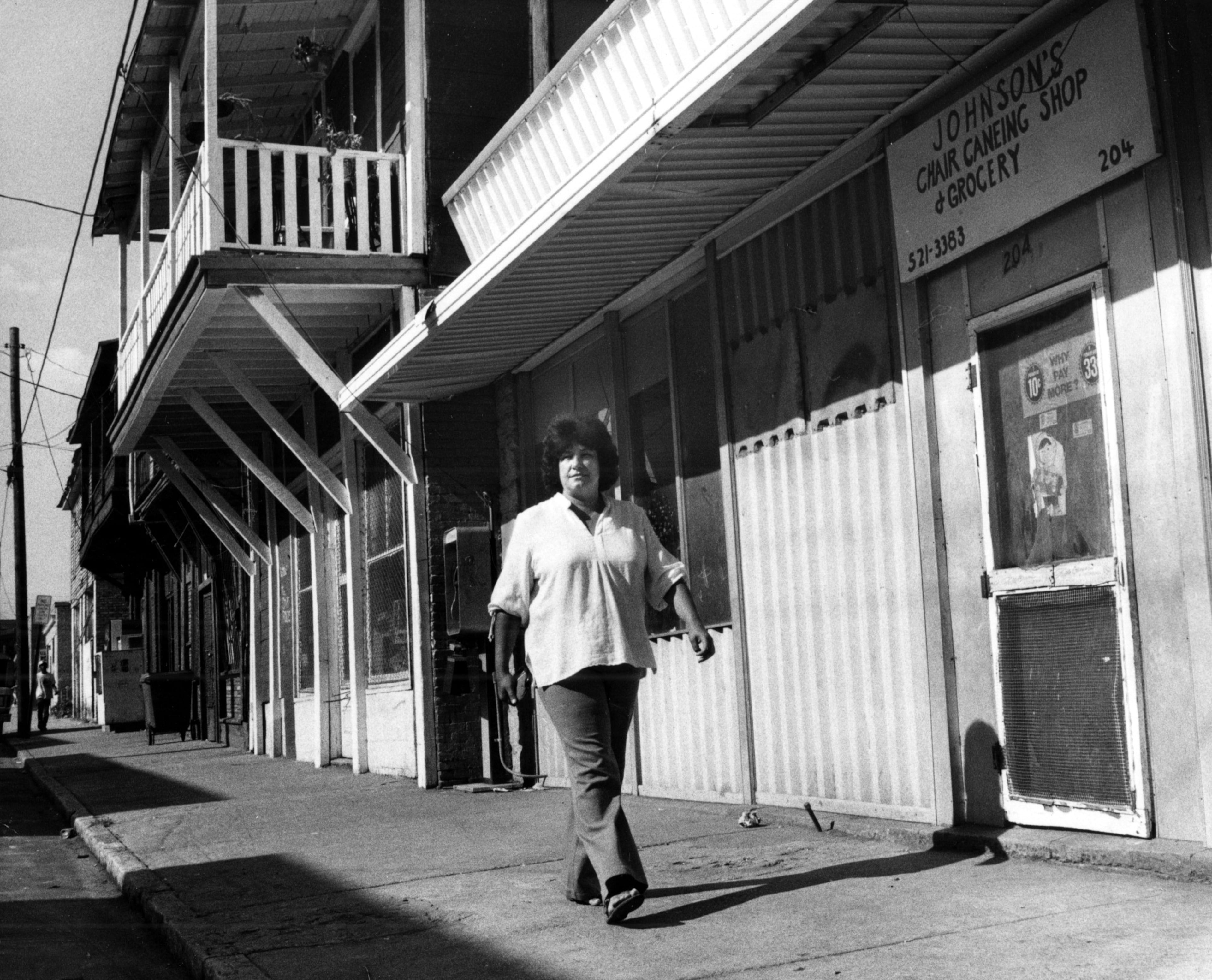 June 19, 1979 - Joyce Brookshire walks down Carroll St. in Cabbagetown.