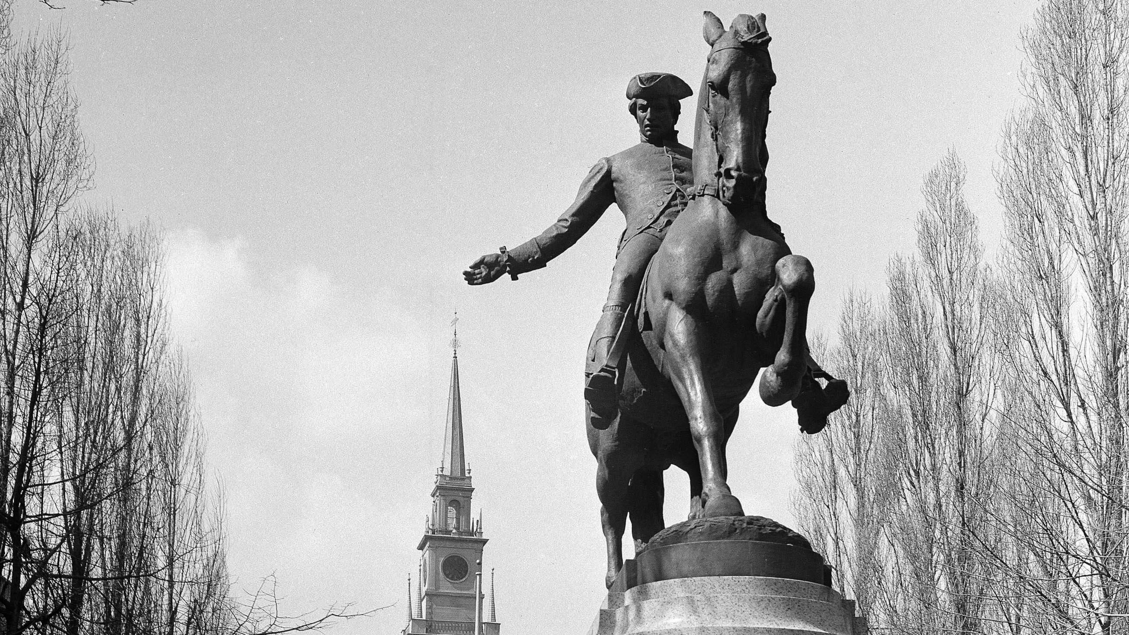 FILE - The statue of Paul Revere in front of Christ Church in Boston on March 23, 1948. (AP Photo/Abe Fox, File)