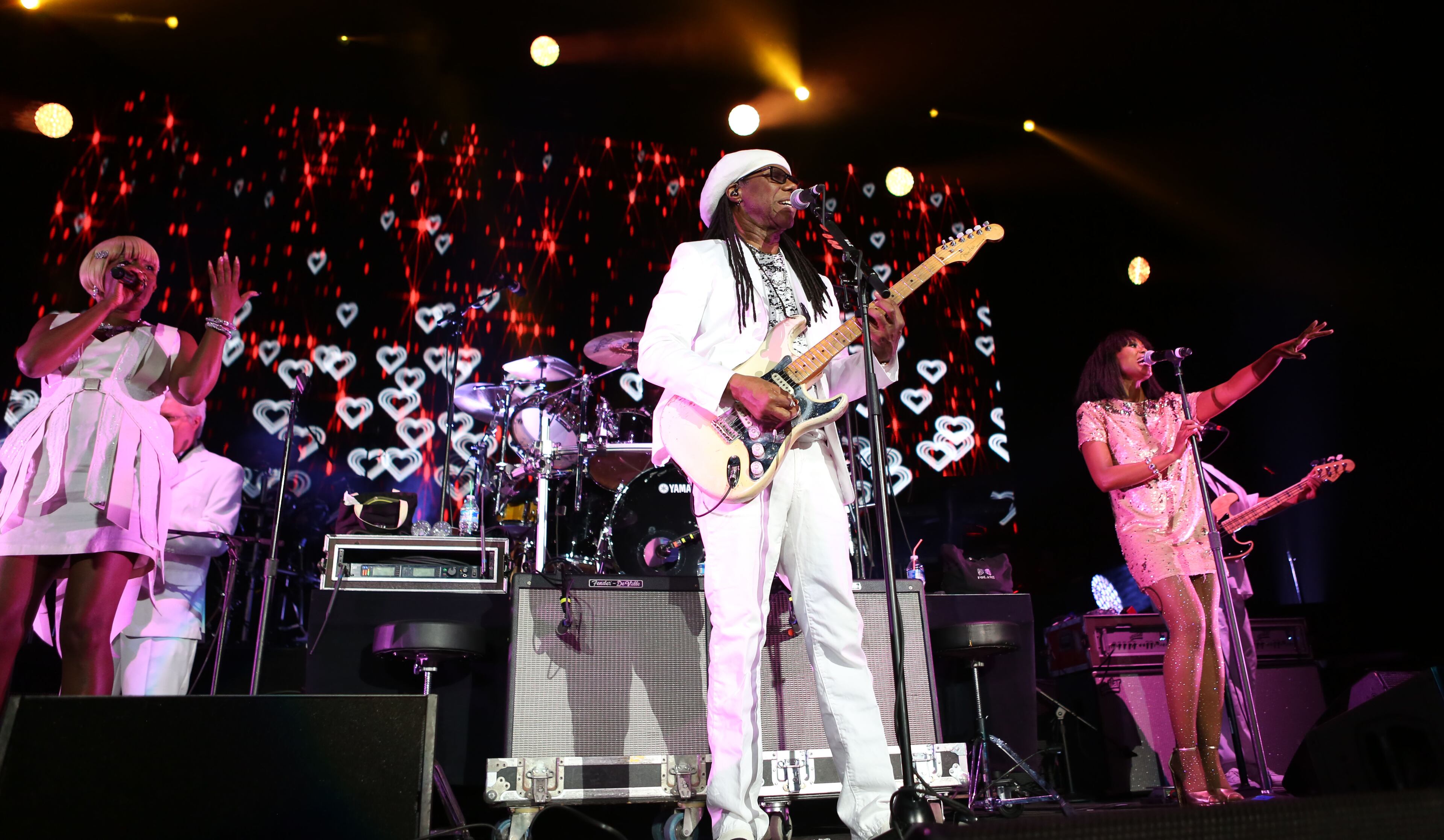 Chic - six players, two backup singers and the incomparable Nile Rodgers -– opened with the similarly themed head-nodders "Everybody Dance" and "Dance, Dance, Dance." The venue was packed with fans pumping fists to "We are Family." (Akili-Casundria Ramsess/Special to the AJC)