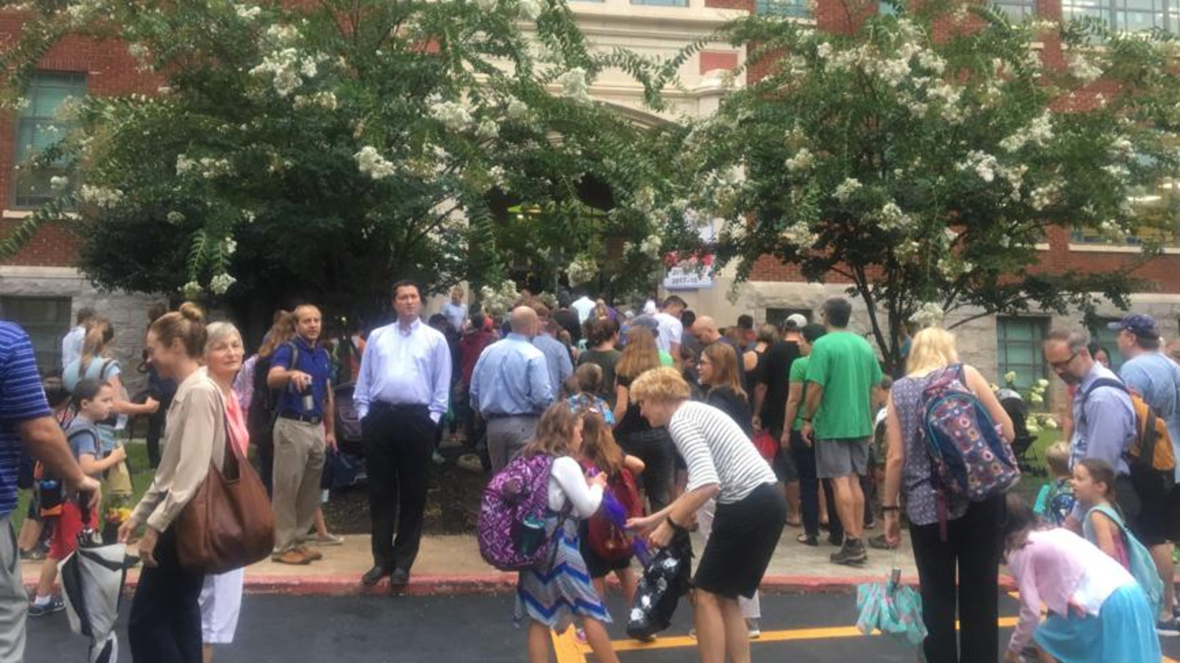 Students and parents rushed through the rain into Oakhurst Elementary School on Wednesday morning for the first day of the 2018-2019 school year. A parent there has alleged that her daughter, 5, was sexually assaulted by a “gender fluid” boy in the girl’s bathroom. (Photo: Amanda C. Coyne/The Atlanta Journal-Constitution)