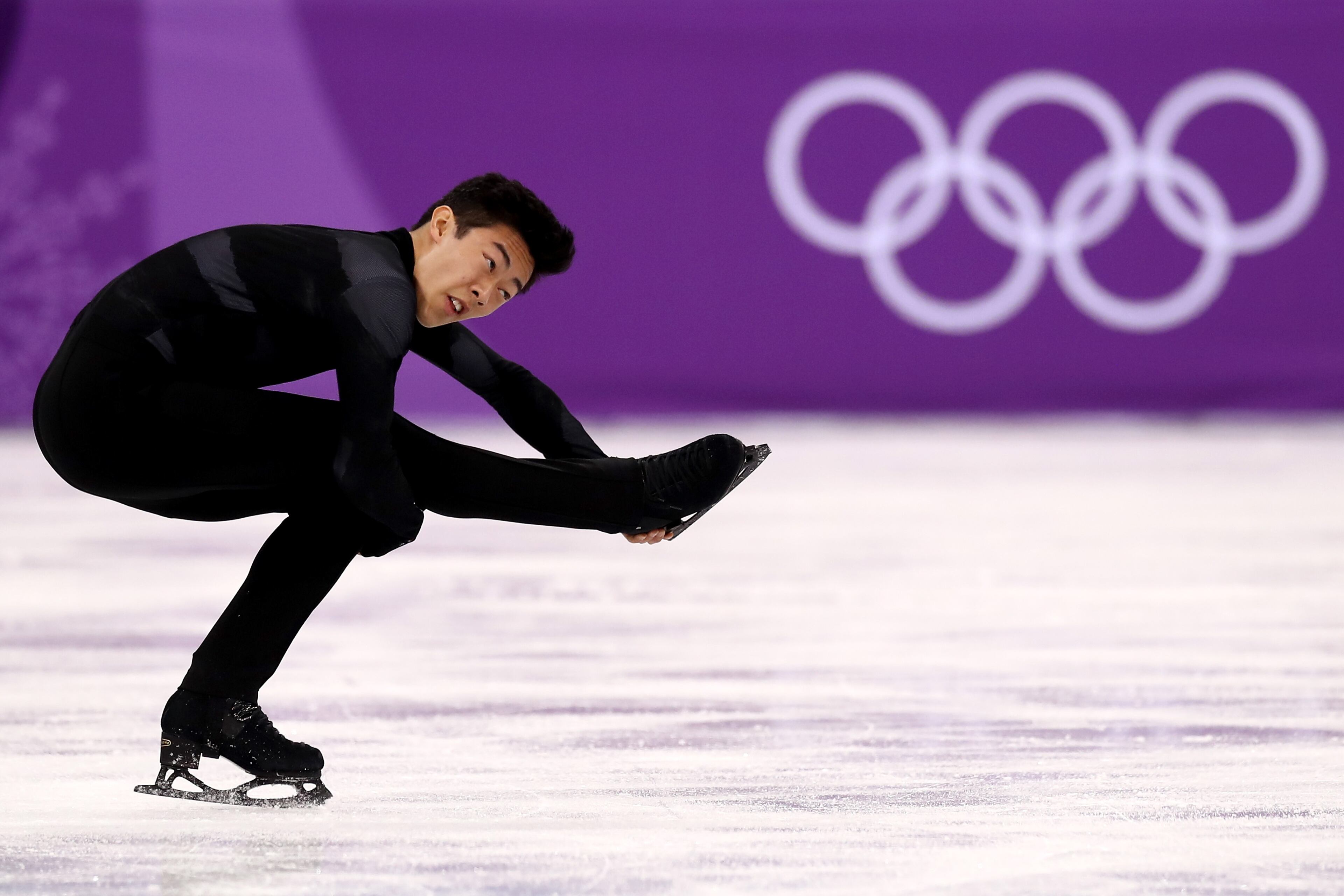 GANGNEUNG, SOUTH KOREA - FEBRUARY 09: Nathan Chen of the United States competes in the Figure Skating Team Event - Men's Single Skating Short Program during the PyeongChang 2018 Winter Olympic Games at Gangneung Ice Arena on February 9, 2018 in Gangneung, South Korea. (Photo by Ronald Martinez/Getty Images)