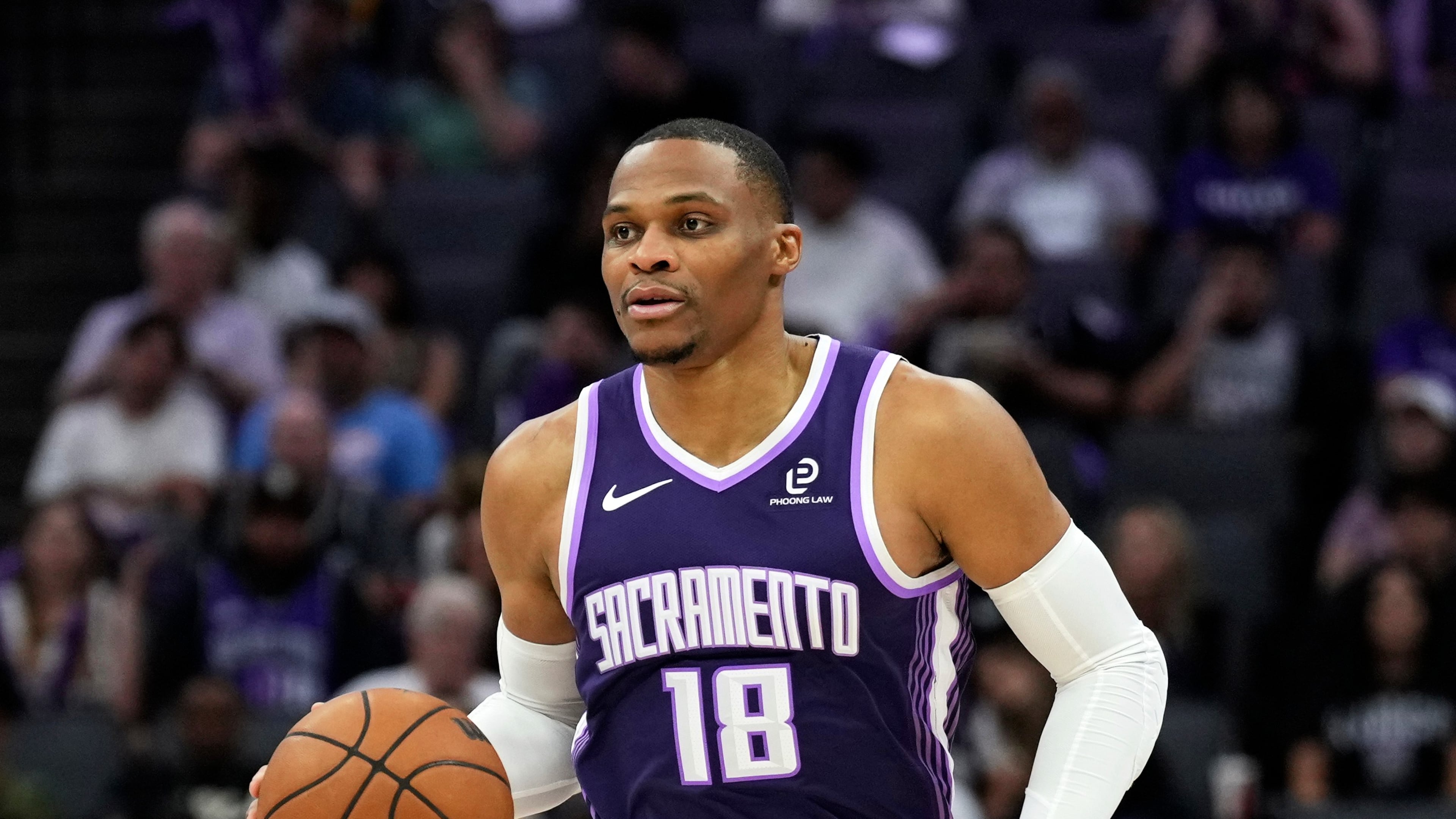 FILE - Sacramento Kings guard Russell Westbrook (18) dribbles the ball during the second half of an NBA basketball game against the Philadelphia 76ers, Thursday, March 19, 2026, in Sacramento, Calif. (AP Photo/Justine Willard,File)