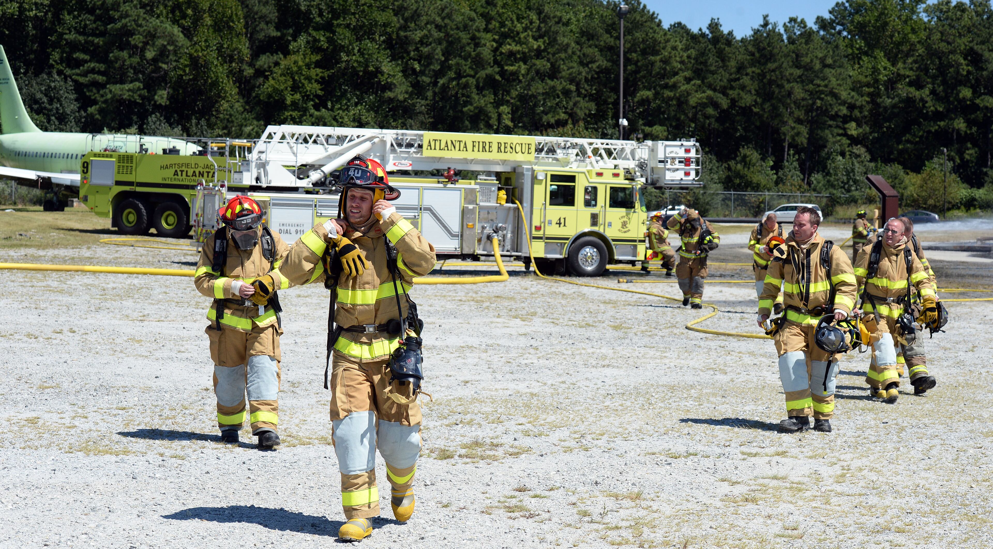 SEPTEMBER 14, 2015 ATLANTA Atlanta Fire Rescue Department firefighters hosted live fire training for attendees at the Aircraft Rescue Fire Fighting (ARFF) Conference, Monday, September, 14, 2015. Firefighters from across the world, battled a simulated fire in an engine and landing gear and also a cascade fire with wing and fuel tanks. Firefighters were Atlanta this week for the 26th Annual ARFF Working Group Conference and Educational Symposium. One of the highlights of the conference was the live fire training at the Hartsfield-Jackson firefighter training site. KENT D. JOHNSON/KDJOHNSON@AJC.COM