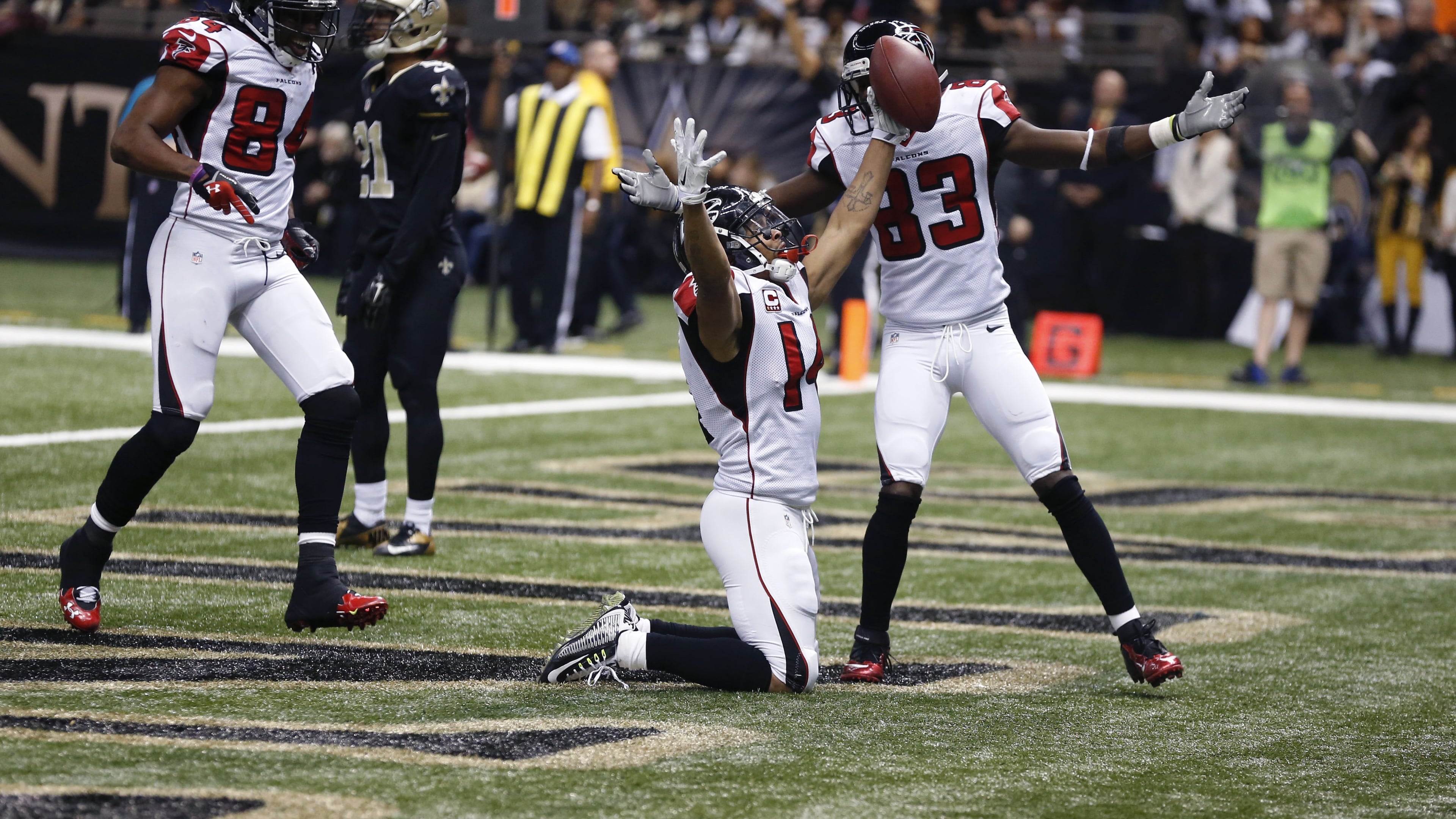 Atlanta Falcons wide receiver Eric Weems (14) celebrates his touchdown with wide receiver Harry Douglas (83) in the first half of an NFL football game against the New Orleans Saints in New Orleans, Sunday, Dec. 21, 2014. (AP Photo/Rogelio Solis) Atlanta Falcons wide receiver Eric Weems (14) celebrates his touchdown with wide receiver Harry Douglas (83) in the first half of an NFL football game against the New Orleans Saints in New Orleans, Sunday, Dec. 21, 2014. (AP Photo/Rogelio Solis)